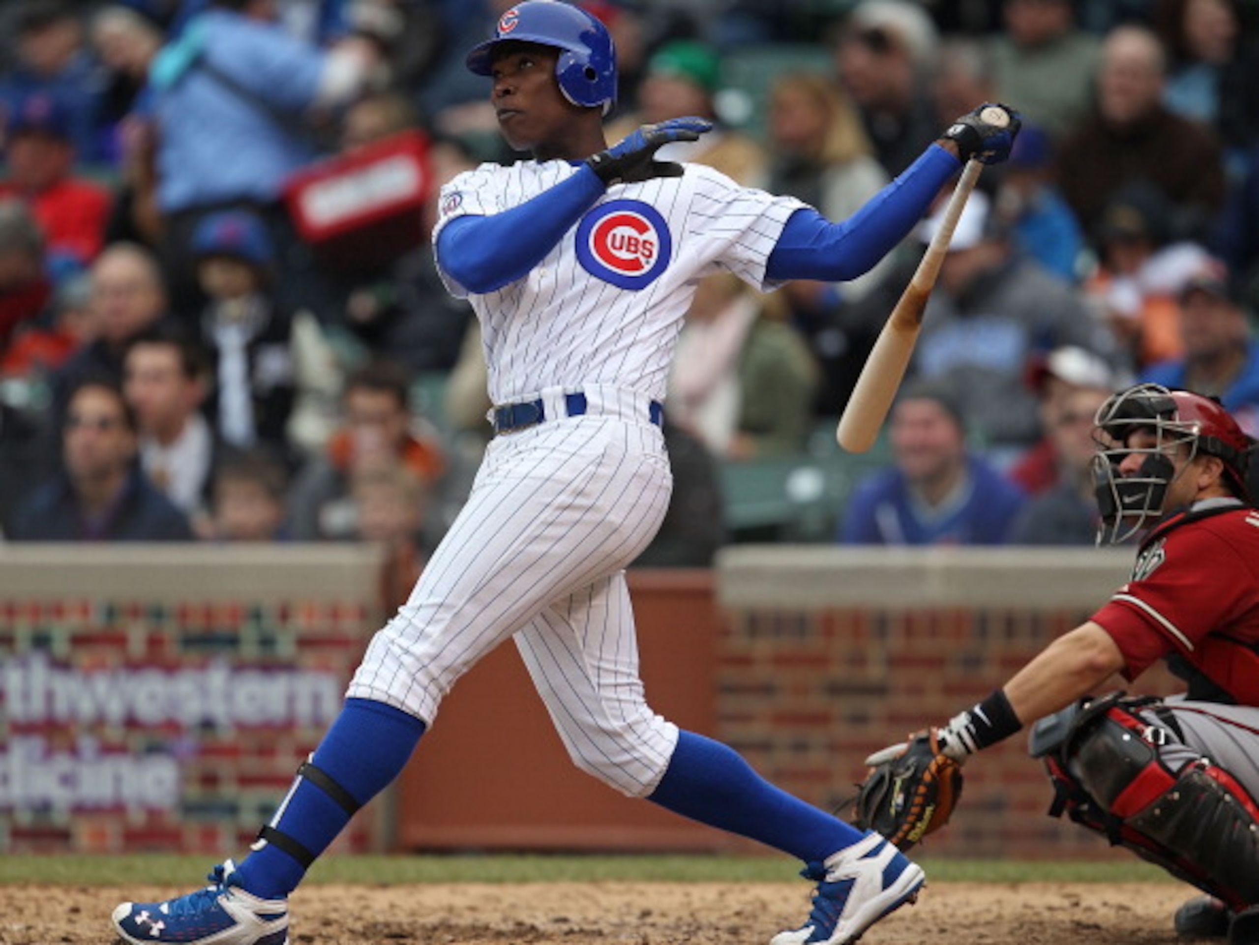CHICAGO, IL - APRIL 06: Alfonso Soriano #12 of the Chicago Cubs hits his third home run of the season in the 7th inning against the Arizona Diamondbacks at Wrigley Field on April 6, 2011 in Chicago, Illinois. The Diamondbacks defeated the Cubs 6-4. (Photo