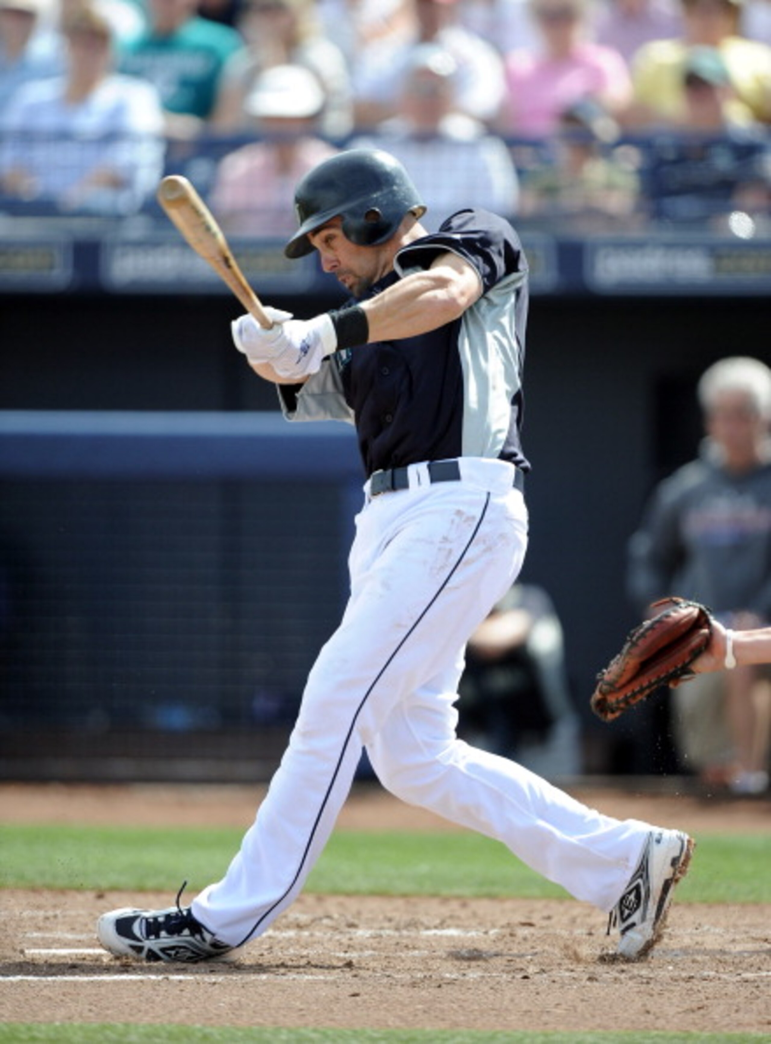 PEORIA, AZ - MARCH 01:  Jack Wilson #2 of the Seattle Mariners at bat against the Texas Rangers during spring training at Peoria Stadium on March 1, 2011 in Peoria, Arizona.  (Photo by Harry How/Getty Images)