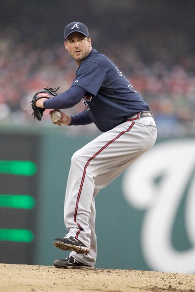 WASHINGTON, DC - MARCH 31:  Starting pitcher Derek Lowe #32 of the Atlanta Braves delivers to a Washington Nationals batter during the third inning at Nationals Park on March 31, 2011 in Washington, DC.  (Photo by Rob Carr/Getty Images)