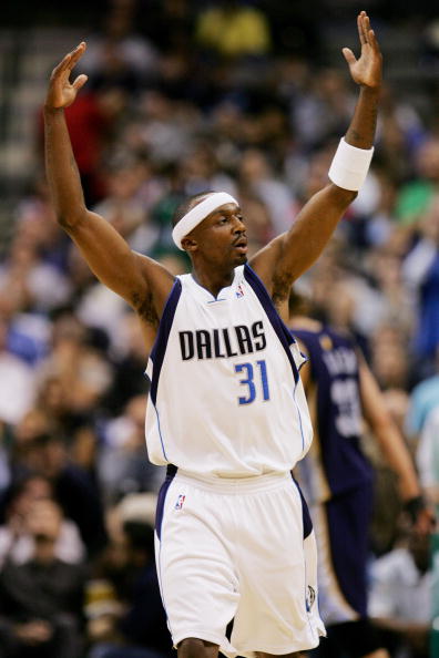 DALLAS - FEBRUARY 7:  Jason Terry #31 of the Dallas Mavericks raises his arms against the Memphis Grizzlies on February 7, 2007 at American Airlines Center in Dallas, Texas. The Mavs won 113-97.  NOTE TO USER: User expressly acknowledges and agrees that,