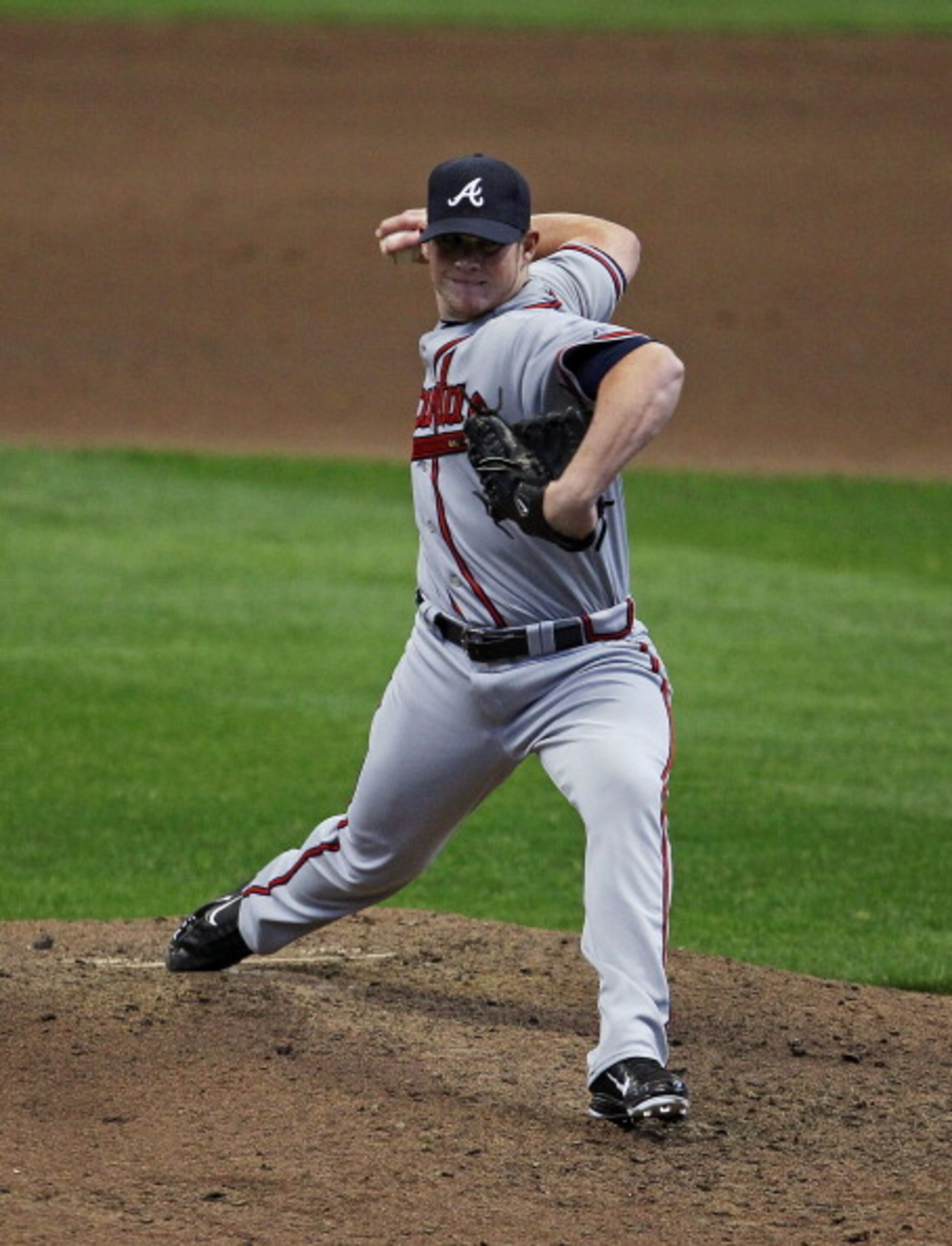 MILWAUKEE, WI - APRIL 04: Craig Kimbrel #46 of the Atlanta Braves delivers the ball in the 9th inning against the Milwaukee Brewers during the home opener at Miller Park on April 4, 2011 in Milwaukee, Wisconsin. The Braves defeated the Brewers 2-1.  (Phot