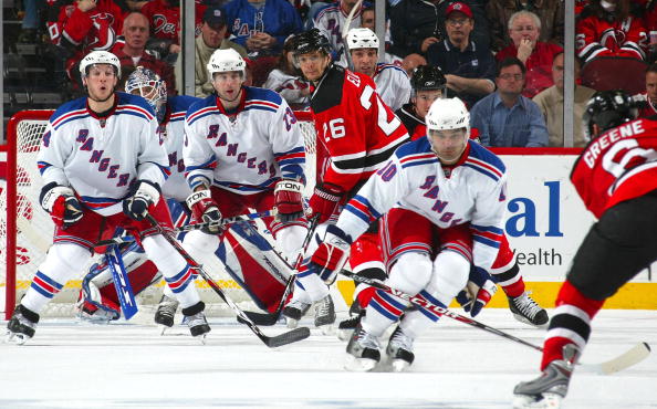 NEWARK, NJ - APRIL 09: Ryan Callahan #24, Chris Drury #13 and Nigel Dawes #10 of the New York Rangers look to block a shot by Andy Greene #6 of the New Jersey Devils on April 9, 2008 during game one of the 2008 NHL conference quarter-final series at the P