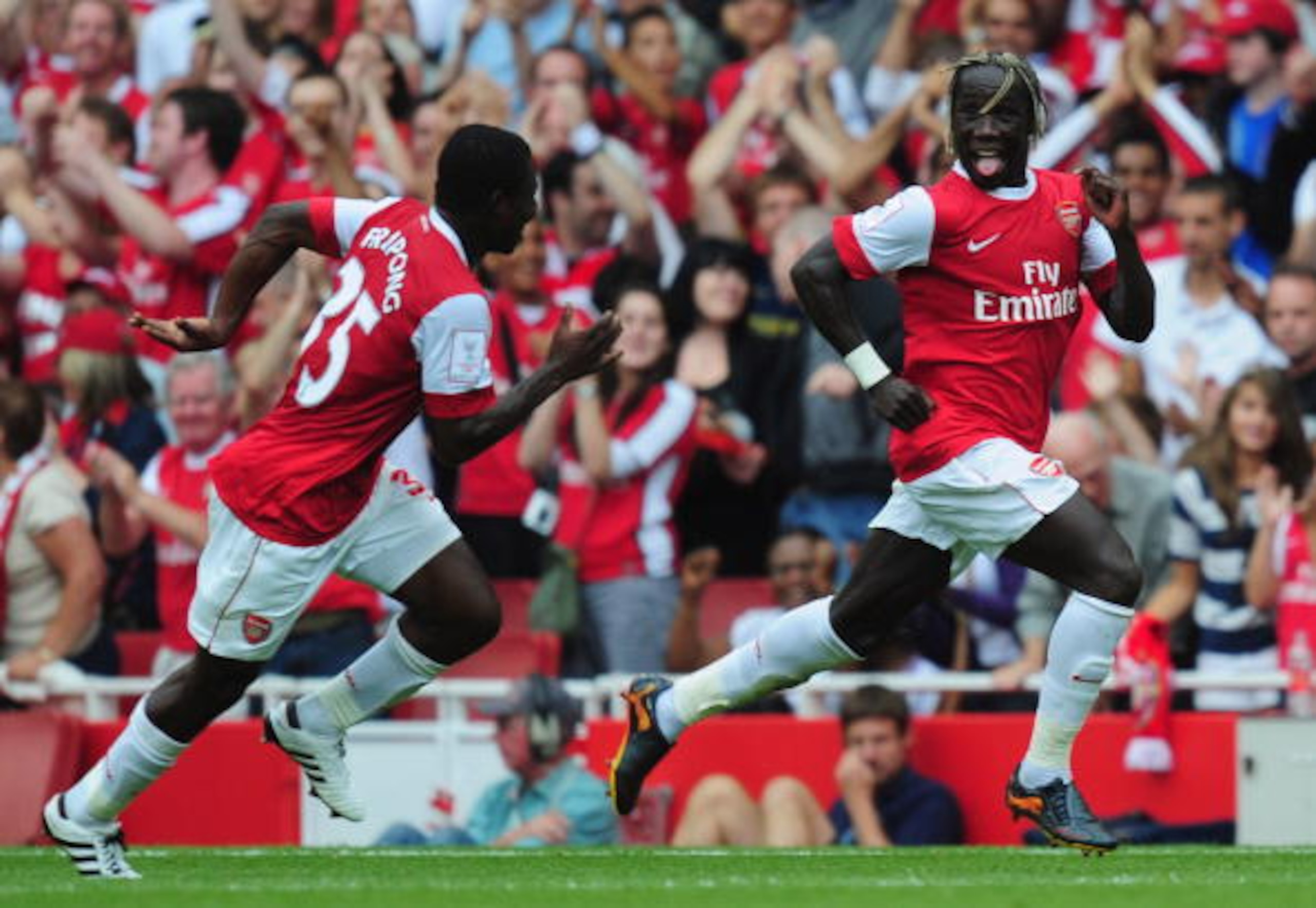 LONDON, ENGLAND - AUGUST 01:   Bacary Sagna of Arsenal celebrates after scoring with team mate Emmanuel Frimpong during the Emirates Cup match between Arsenal and Celtic at Emirates Stadium on August 1, 2010 in London, England.  (Photo by Mike Hewitt/Gett