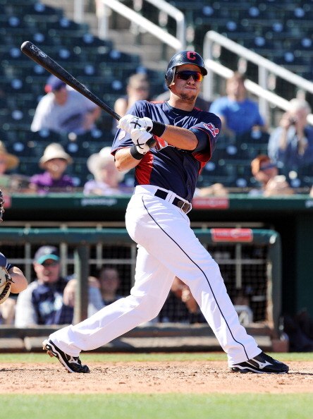 GOODYEAR, AZ - MARCH 11:  Lonnie Chisenhall #76 of the Cleveland Indians follows through on a swing against the Seattle Mariners at Goodyear Ballpark on March 11, 2011 in Goodyear, Arizona.  (Photo by Norm Hall/Getty Images)