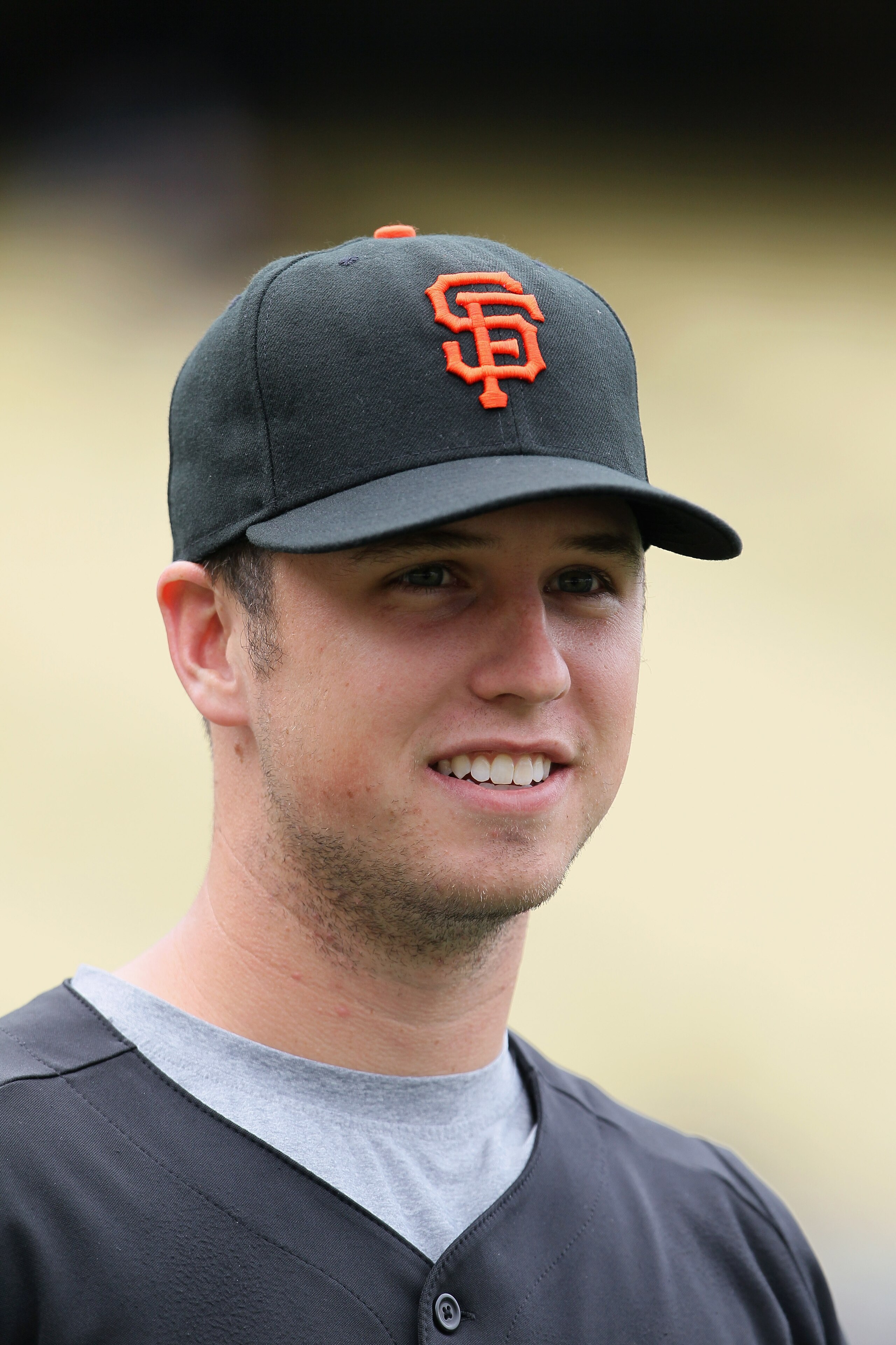 LOS ANGELES, CA - APRIL 03:  Buster Posey #28 of the San Francisco Giants looks on prior to the start of the game against the Los Angeles Dodgers at Dodger Stadium on April 3, 2011 in Los Angeles, California.  (Photo by Jeff Gross/Getty Images)