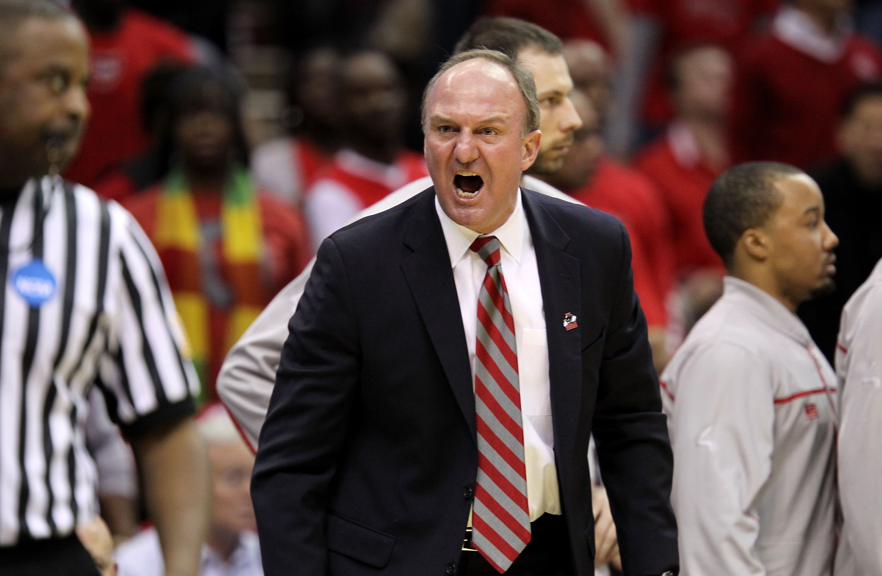 CLEVELAND, OH - MARCH 20: Head coach Thad Matta of the Ohio State Buckeyes yells from the bench during the first half against the George Mason Patriots during the third of the 2011 NCAA men's basketball tournament at Quicken Loans Arena on March 20, 2011