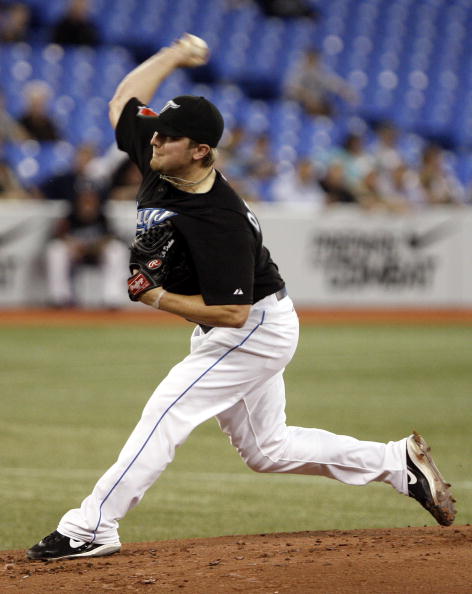 TORONTO, ON - SEPTEMBER 28: Kyle Drabek #4 of the Toronto Blue Jays throws agianst the New York Yankees during an MLB game at the Rogers Centre September 28, 2010 in Toronto, Ontario, Canada. (Photo by Abelimages/Getty Images)