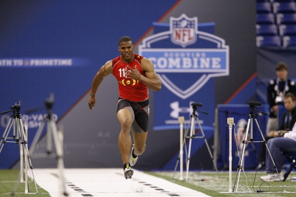 INDIANAPOLIS, IN - FEBRUARY 27: Cam Newton runs the 40-yard dash during the 2011 NFL Scouting Combine at Lucas Oil Stadium on February 27, 2011 in Indianapolis, Indiana. (Photo by Joe Robbins/Getty Images)