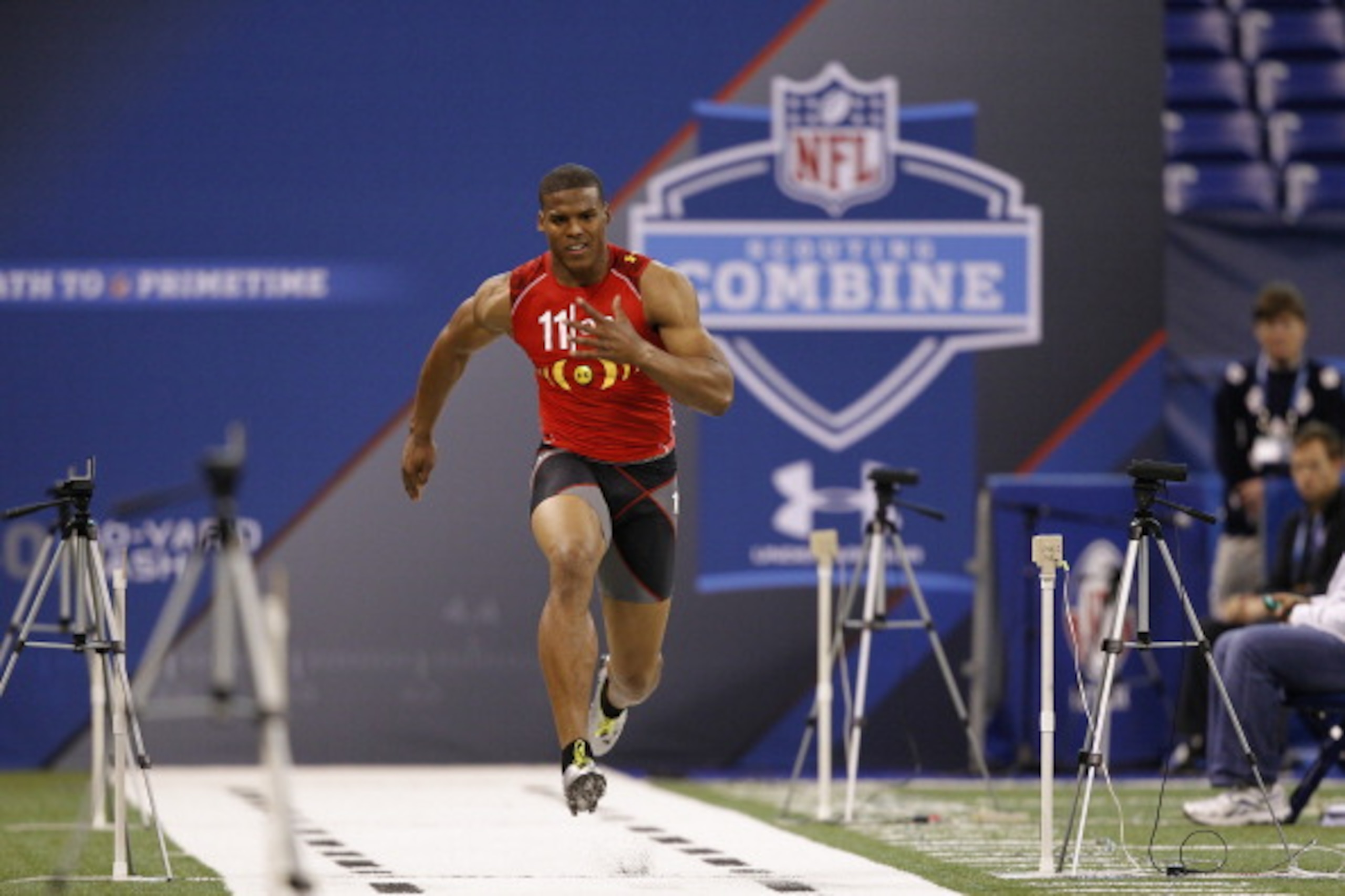 INDIANAPOLIS, IN - FEBRUARY 27: Cam Newton runs the 40-yard dash during the 2011 NFL Scouting Combine at Lucas Oil Stadium on February 27, 2011 in Indianapolis, Indiana. (Photo by Joe Robbins/Getty Images)