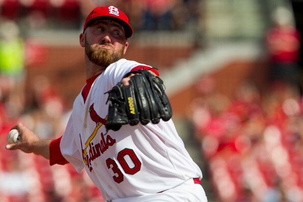 ST. LOUIS, MO - APRIL 6: Reliever Jason Motte #30 of the St. Louis Cardinals pitches against the Pittsburgh Pirates at Busch Stadium on April 6, 2011 in St. Louis, Missouri.  (Photo by Dilip Vishwanat/Getty Images)