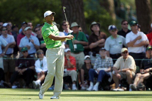 AUGUSTA, GA - APRIL 07:  Tiger Woods watches his third shot on the 15th hole during the first round of the 2011 Masters Tournament at Augusta National Golf Club on April 7, 2011 in Augusta, Georgia.  (Photo by Jamie Squire/Getty Images)