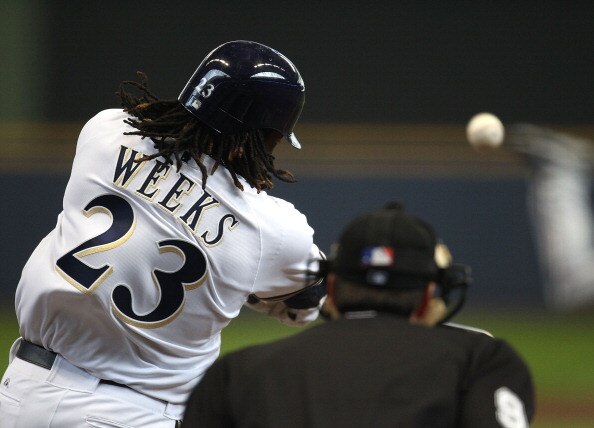 MILWAUKEE, WI - APRIL 04: Rickie Weeks #23 of the Milwaukee Brewers hits a solo home run in the 3rd inning against the Atlanta Braves during the home opener at Miller Park on April 4, 2011 in Milwaukee, Wisconsin. (Photo by Jonathan Daniel/Getty Images)