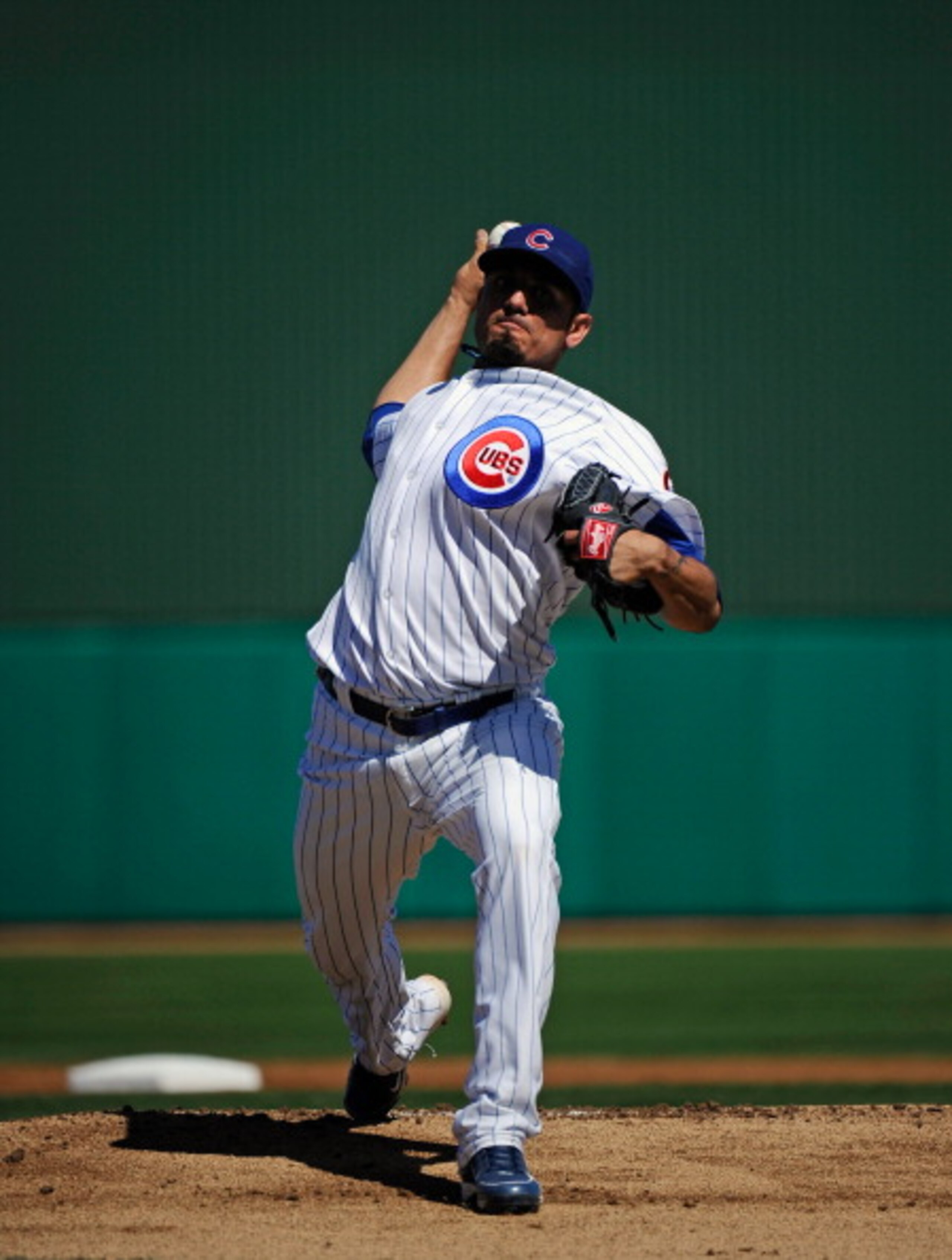 MESA, AZ - MARCH 09:  Matt Garza #17 pitcher of the Chicago Cubs throws a ptich against the Kansas City Royals during the spring training baseball game at HoHoKam Stadium on March 9, 2011 in Mesa, Arizona.  (Photo by Kevork Djansezian/Getty Images)