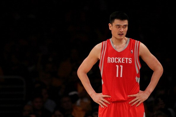 LOS ANGELES, CA - OCTOBER 26:  Yao Ming #11 of the Houston Rockets looks on during their opening night game against the Los Angeles Lakers at Staples Center on October 26, 2010 in Los Angeles, California. NOTE TO USER: User expressly acknowledges and agre