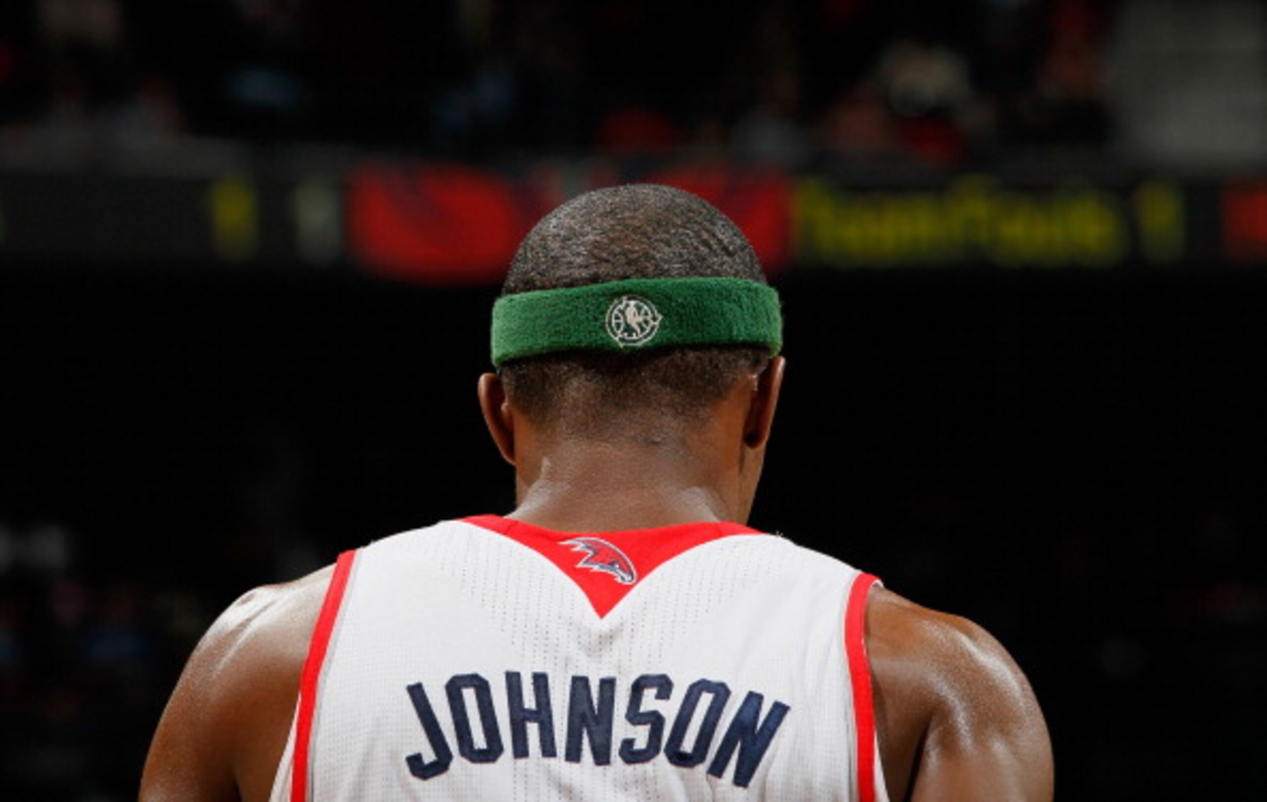 ATLANTA, GA - APRIL 05:  Joe Johnson #2 of the Atlanta Hawks wears a headband promoting the NBA's recycling campaign during the game against the San Antonio Spurs at Philips Arena on April 5, 2011 in Atlanta, Georgia.  NOTE TO USER: User expressly acknowl