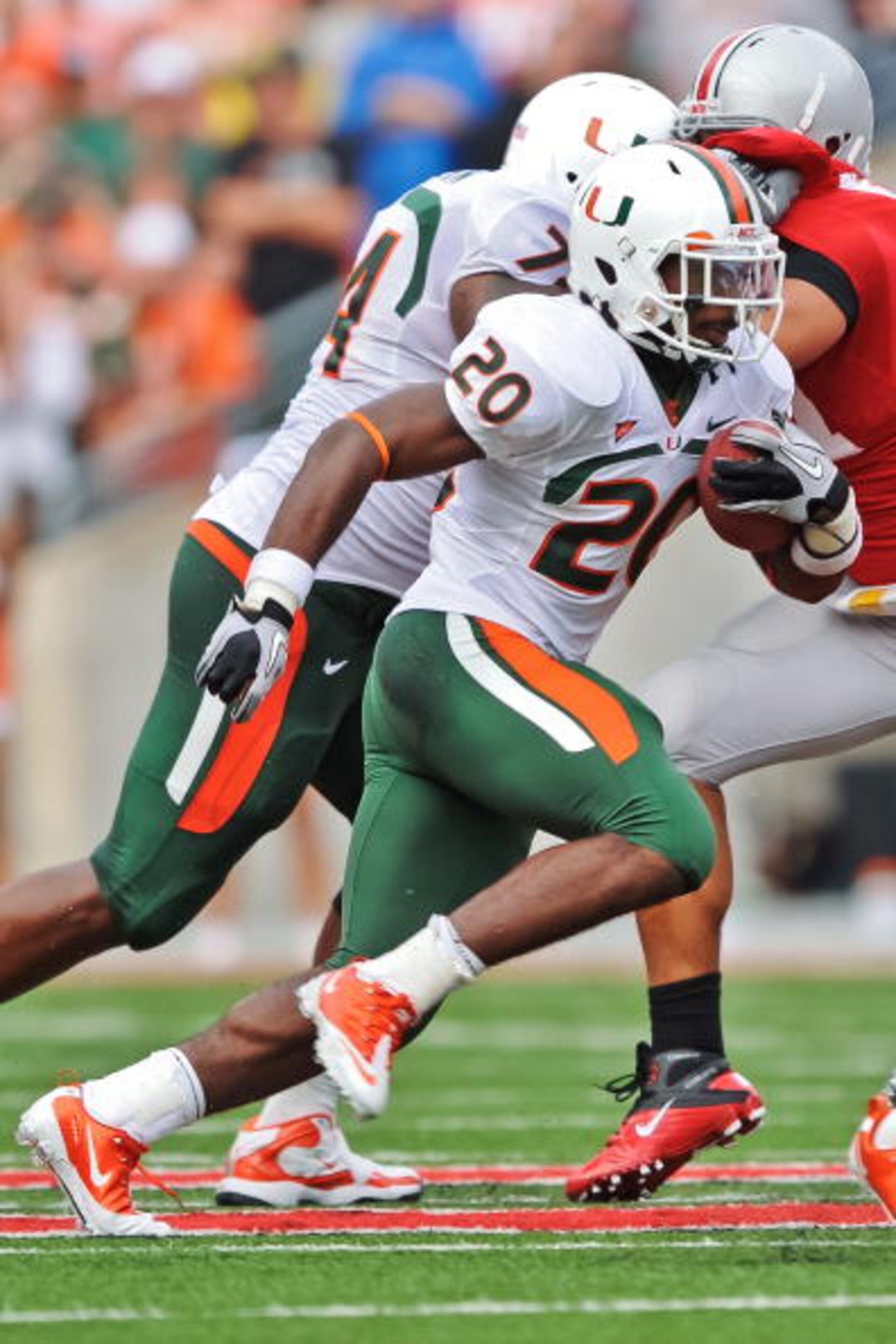 COLUMBUS, OH - SEPTEMBER 11:  Damien Berry #20 of the Miami Hurricanes runs with the ball against the Ohio State Buckeyes at Ohio Stadium on September 11, 2010 in Columbus, Ohio.  (Photo by Jamie Sabau/Getty Images)