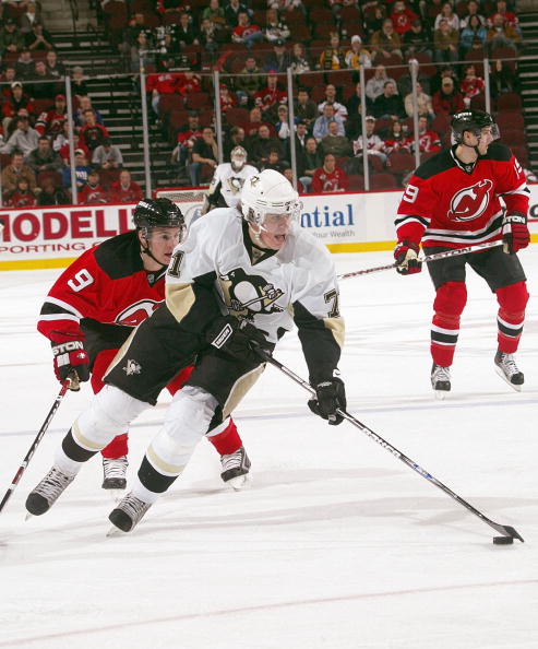 NEWARK - JANUARY 29: Evgeni Malkin #71 of the Pittsburgh Penguins skates against Zach Parise #9 of the New Jersey Devils on January 29, 2008 at the Prudential Center in Newark, New Jersey. (Photo by: Bruce Bennett/Getty Images)