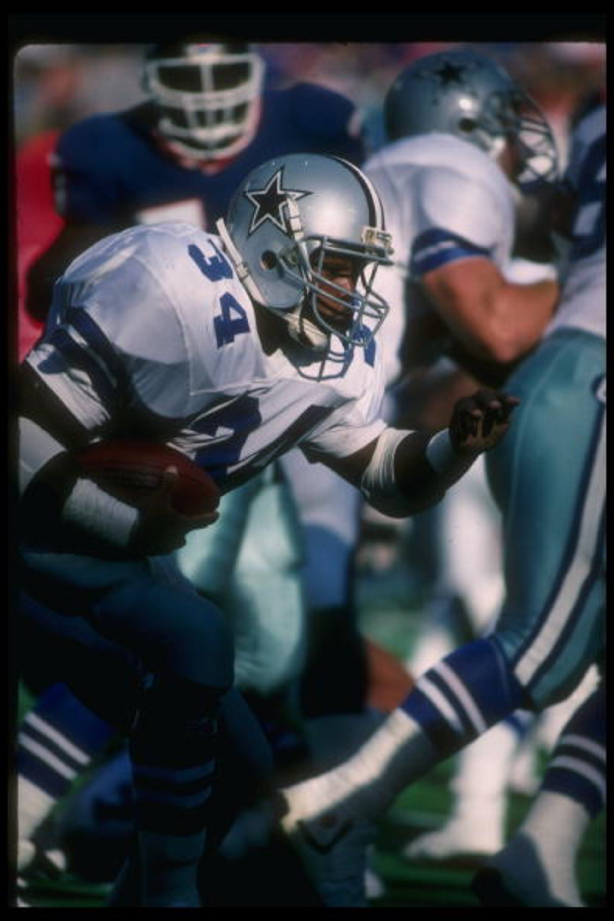 6 Nov 1988:  Running back Herschel Walker of the Dallas Cowboys moves the ball during a game against the New York Giants at Giants Stadium in East Rutherford, New Jersey.  The Cowboys won the game, 29-21. Mandatory Credit: Allsport  /Allsport