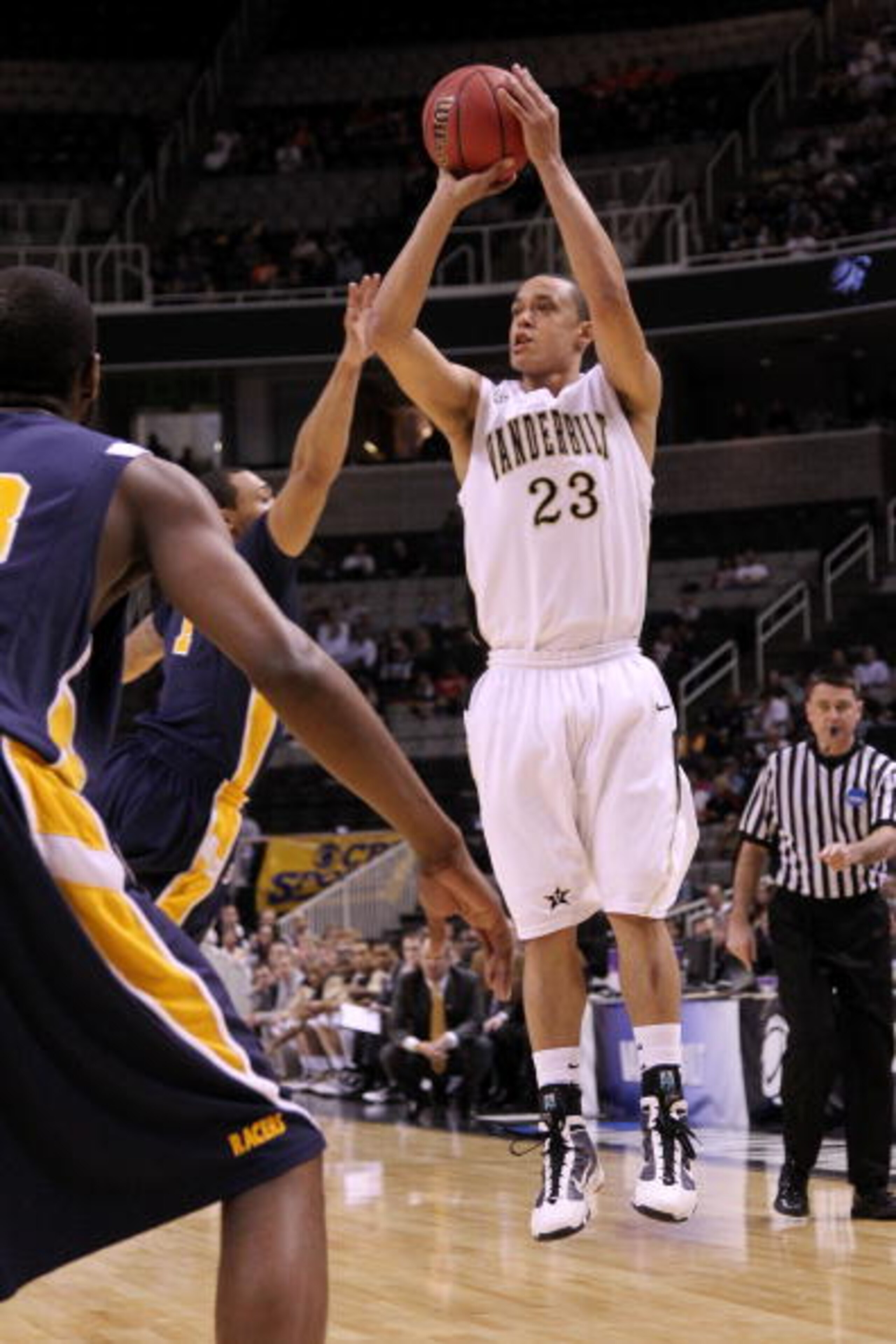 SAN JOSE, CA - MARCH 18:  Guard John Jenkins #23 of the Vanderbilt Commodores takes a shot against the Murray State Racers during the first round of the 2010 NCAA menï¿½s basketball tournament at HP Pavilion on March 18, 2010 in San Jose, California.  (Phot