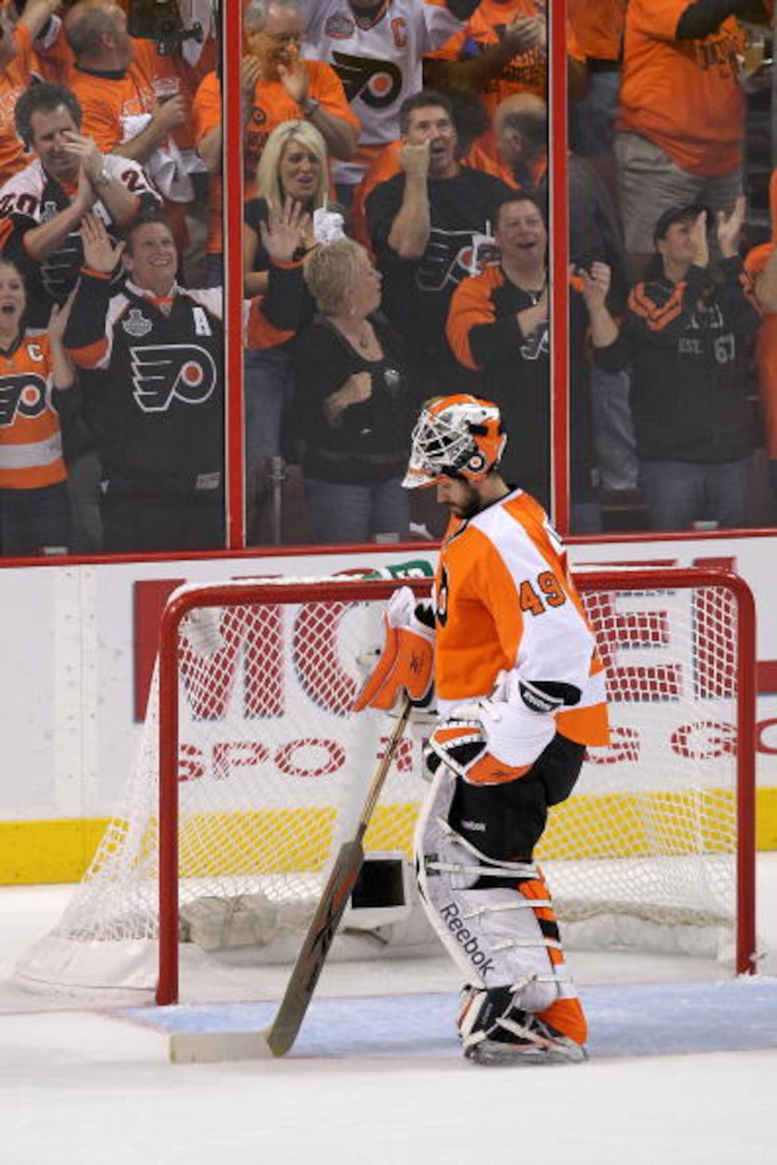 PHILADELPHIA - JUNE 09: Fans of the Philadelphia Flyers cheer behind Michael Leighton #49 of the Flyers in Game Six of the 2010 NHL Stanley Cup Final against the Chicago Blackhawks at the Wachovia Center on June 9, 2010 in Philadelphia, Pennsylvania. (P PHILADELPHIA - JUNE 09: Fans of the Philadelphia Flyers cheer behind Michael Leighton #49 of the Flyers in Game Six of the 2010 NHL Stanley Cup Final against the Chicago Blackhawks at the Wachovia Center on June 9, 2010 in Philadelphia, Pennsylvania. (P