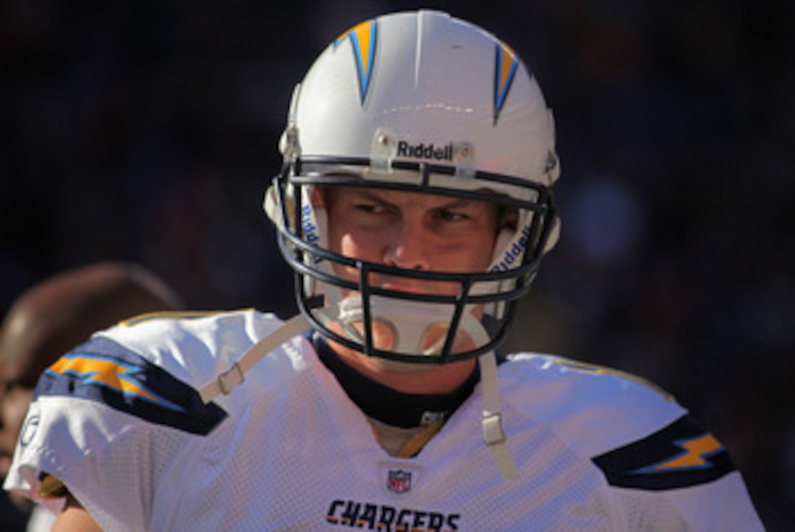DENVER - JANUARY 02:  Quarterback Philip Rivers #17 of the San Diego Chargers takes the field against the Denver Broncos at INVESCO Field at Mile High on January 2, 2011 in Denver, Colorado. The Chargers defeated the Broncos 33-28.  (Photo by Doug Pensing