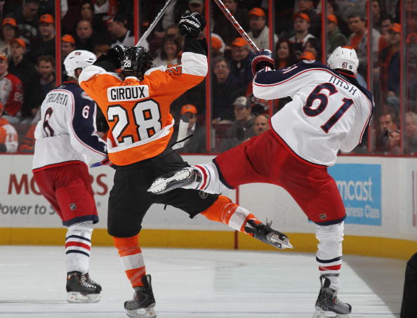 PHILADELPHIA - JANUARY 19: Rick Nash #61 of the Columbus Blue Jackets bounces off Claude Giroux #28 of the Philadelphia Flyers at the Wachovia Center on January 19, 2010 in Philadelphia, Pennsylvania.  (Photo by Bruce Bennett/Getty Images)