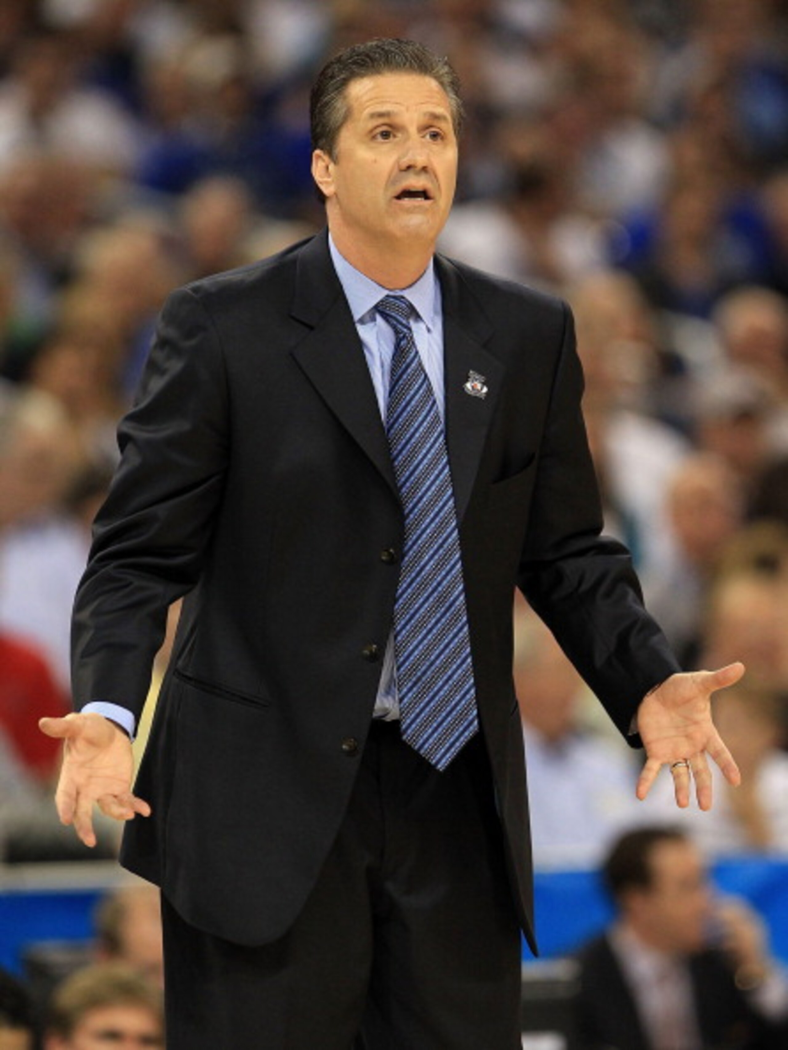 HOUSTON, TX - APRIL 02:  Head coach John Calipari of the Kentucky Wildcats shouts from the sidelines against the Connecticut Huskies during the National Semifinal game of the 2011 NCAA Division I Men's Basketball Championship at Reliant Stadium on April 2