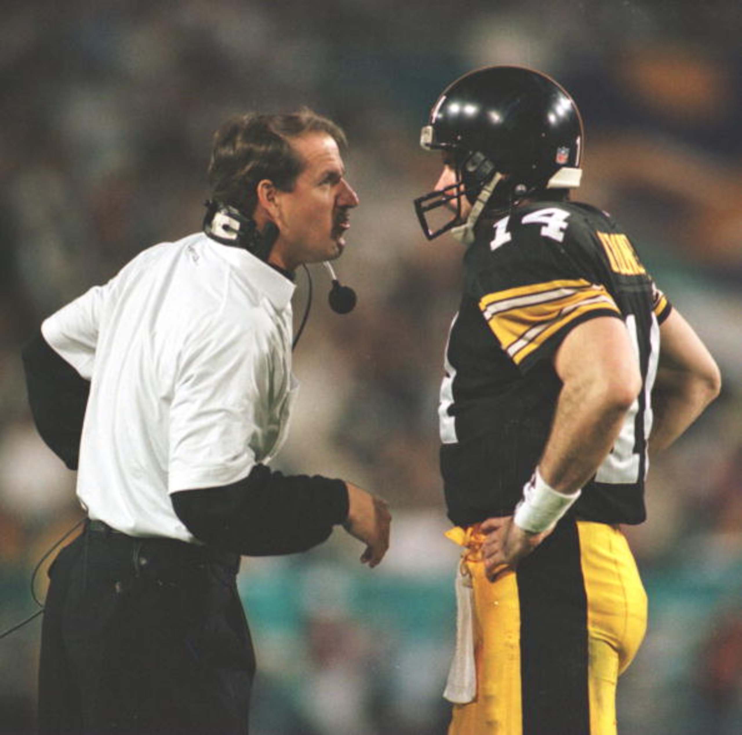 28 Jan 1996:  Head Coach Bill Cowher (left) and quarterback Neil O'Donnell (right) of the Pittsburgh Steelers share a few words during the Steelers game versus the Dallas Cowboys in Super Bowl XXX at Sun Devil Stadium in Tempe, Arizona.  The Steelers went
