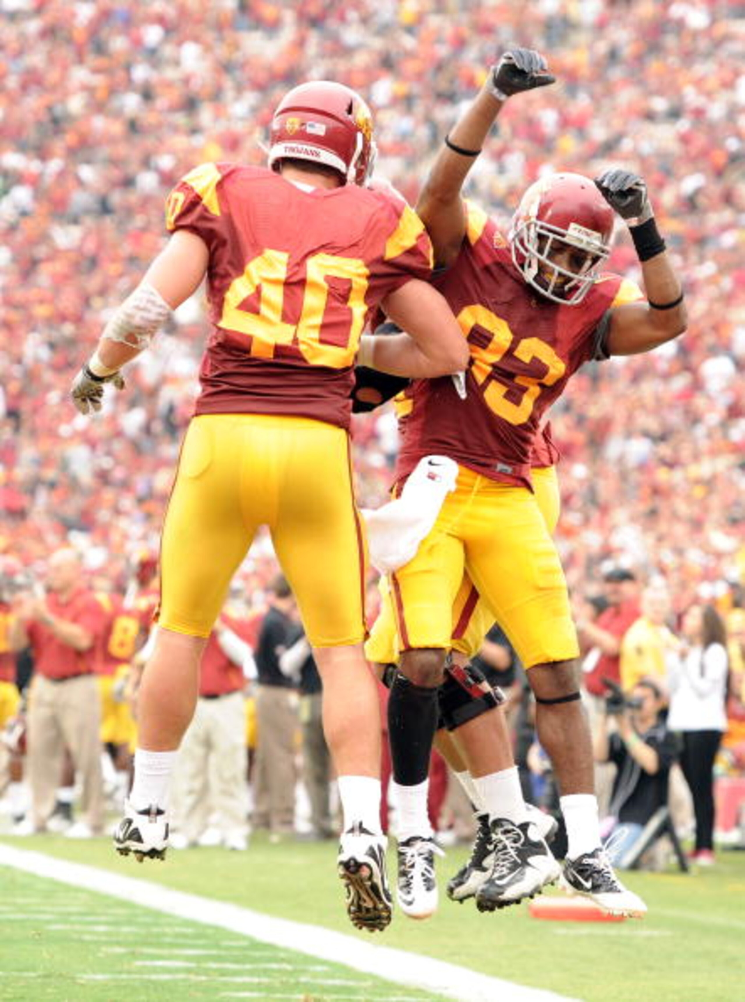 LOS ANGELES, CA - OCTOBER 16:  Ronald Johnson #83 of the USC Trojans celebrates his touchdown iwth Rhett Ellison #40 for a 35-0 lead over the California Golden Bears during the second quarter at Los Angeles Memorial Coliseum on October 16, 2010 in Los Ang