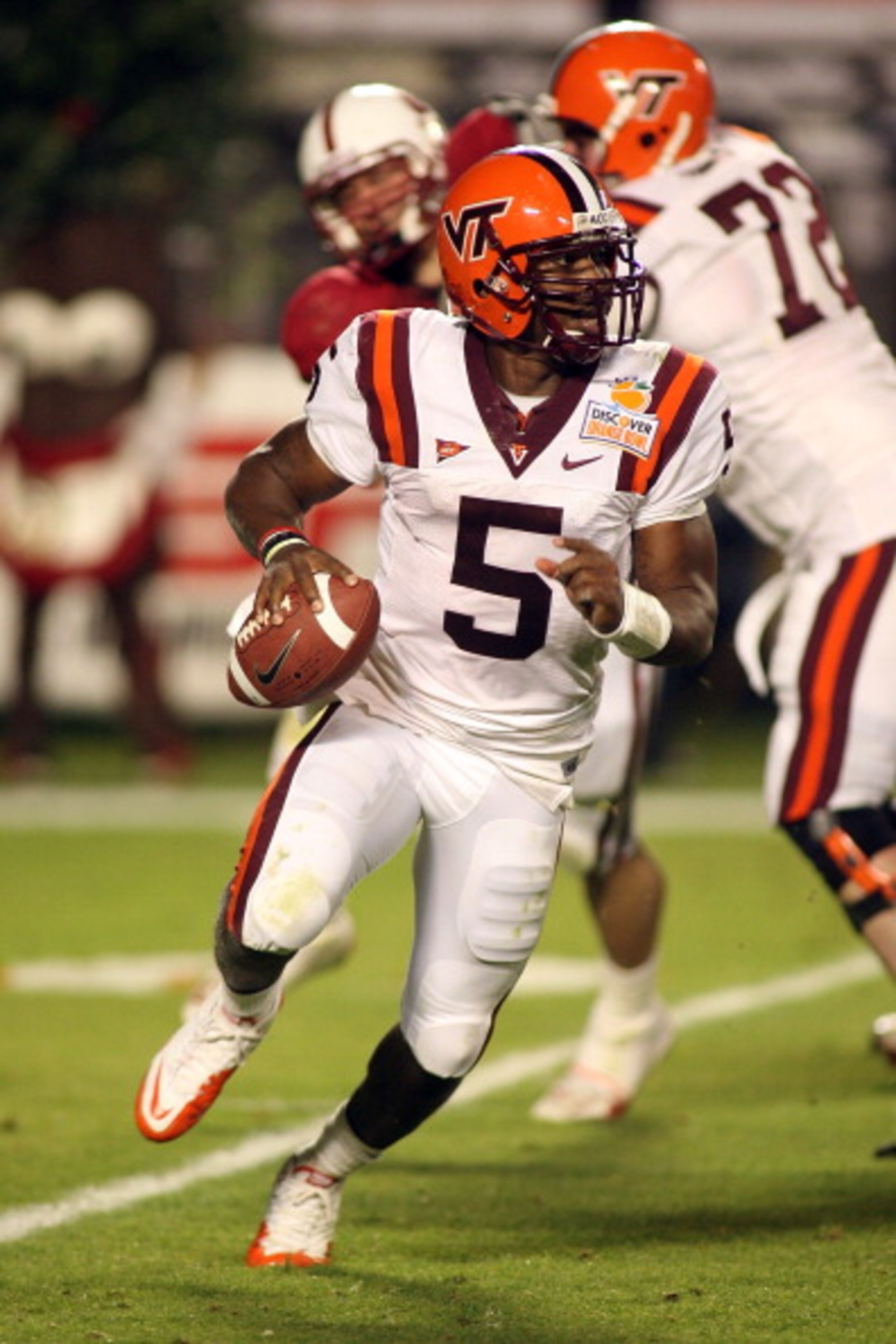 MIAMI, FL - JANUARY 03: Tyrod Taylor #5 of the Virginia Tech Hokies rolls out of the pocket against the Stanford Cardinal during the 2011 Discover Orange Bowl at Sun Life Stadium on January 3, 2011 in Miami, Florida. Stanford won 40-12. (Photo by Marc Se MIAMI, FL - JANUARY 03: Tyrod Taylor #5 of the Virginia Tech Hokies rolls out of the pocket against the Stanford Cardinal during the 2011 Discover Orange Bowl at Sun Life Stadium on January 3, 2011 in Miami, Florida. Stanford won 40-12. (Photo by Marc Se