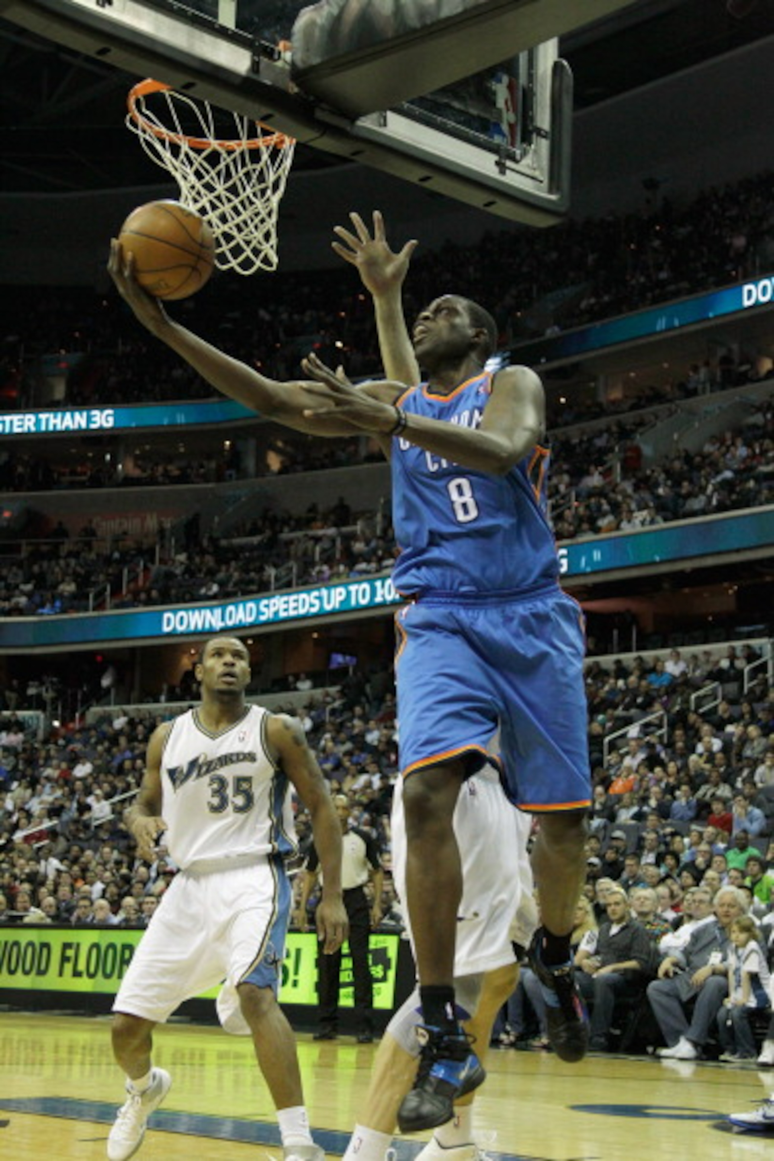 WASHINGTON, DC - MARCH 14: Nazr Mohammed #8 of the Oklahoma City Thunder puts up a shot against the Washington Wizards during the first half at the Verizon Center on March 14, 2011 in Washington, DC. NOTE TO USER: User expressly acknowledges and agrees t WASHINGTON, DC - MARCH 14: Nazr Mohammed #8 of the Oklahoma City Thunder puts up a shot against the Washington Wizards during the first half at the Verizon Center on March 14, 2011 in Washington, DC. NOTE TO USER: User expressly acknowledges and agrees t