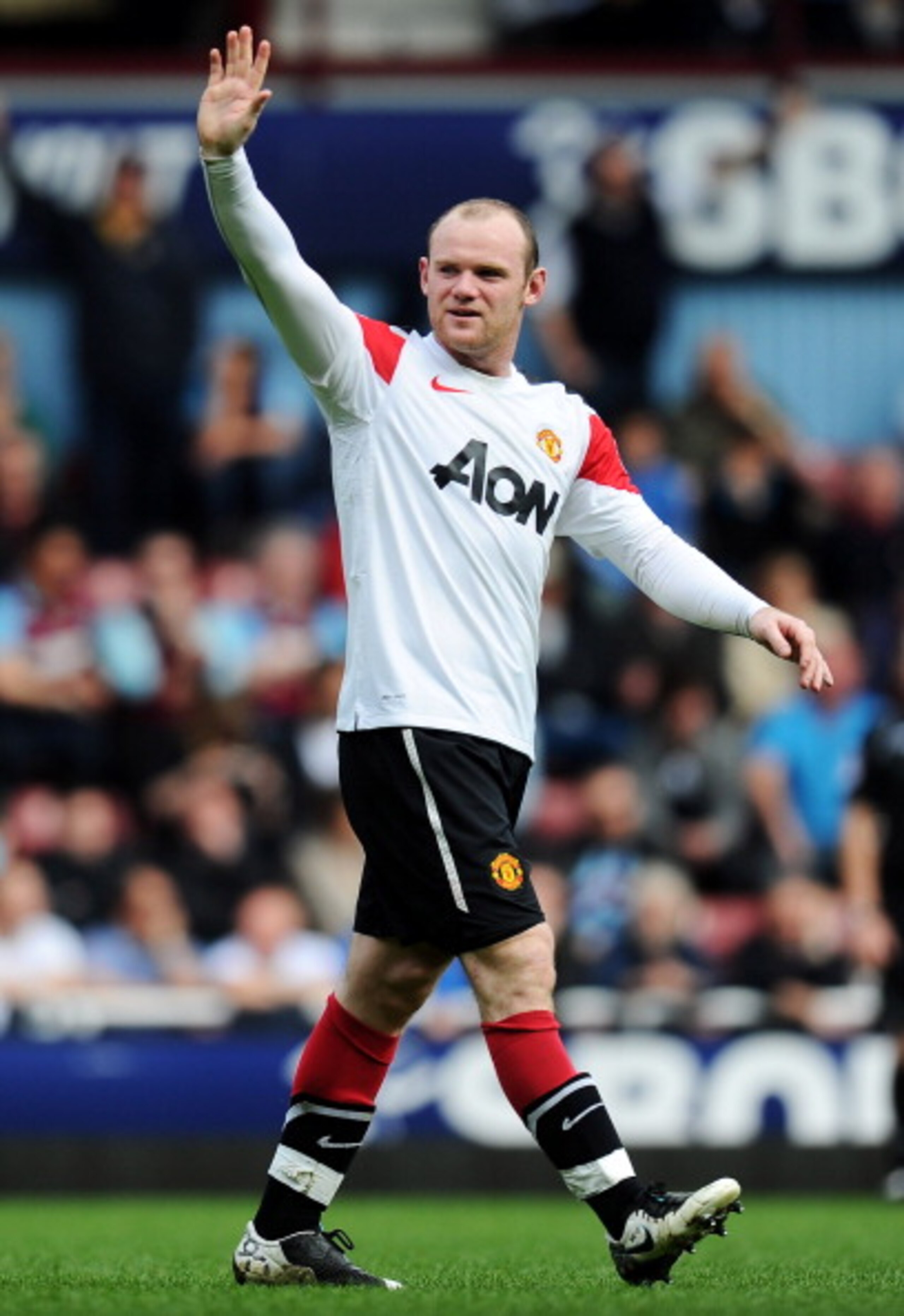 LONDON, ENGLAND - APRIL 02: Wayne Rooney of Manchester United celebrates his hat trick during the Barclays Premier League match between West Ham United and Manchester United at the Boleyn Ground on April 2, 2011 in London, England. (Photo by Mike Hewitt LONDON, ENGLAND - APRIL 02: Wayne Rooney of Manchester United celebrates his hat trick during the Barclays Premier League match between West Ham United and Manchester United at the Boleyn Ground on April 2, 2011 in London, England. (Photo by Mike Hewitt