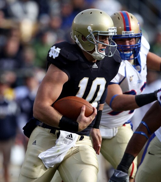 SOUTH BEND, IN - OCTOBER 30: Dayne Crist #10 of the Notre Dame Fighting Irish runs for a first down but was injured on the play against the Tulsa Golden Hurricane at Notre Dame Stadium on October 30, 2010 in South Bend, Indiana. (Photo by Jonathan Daniel/