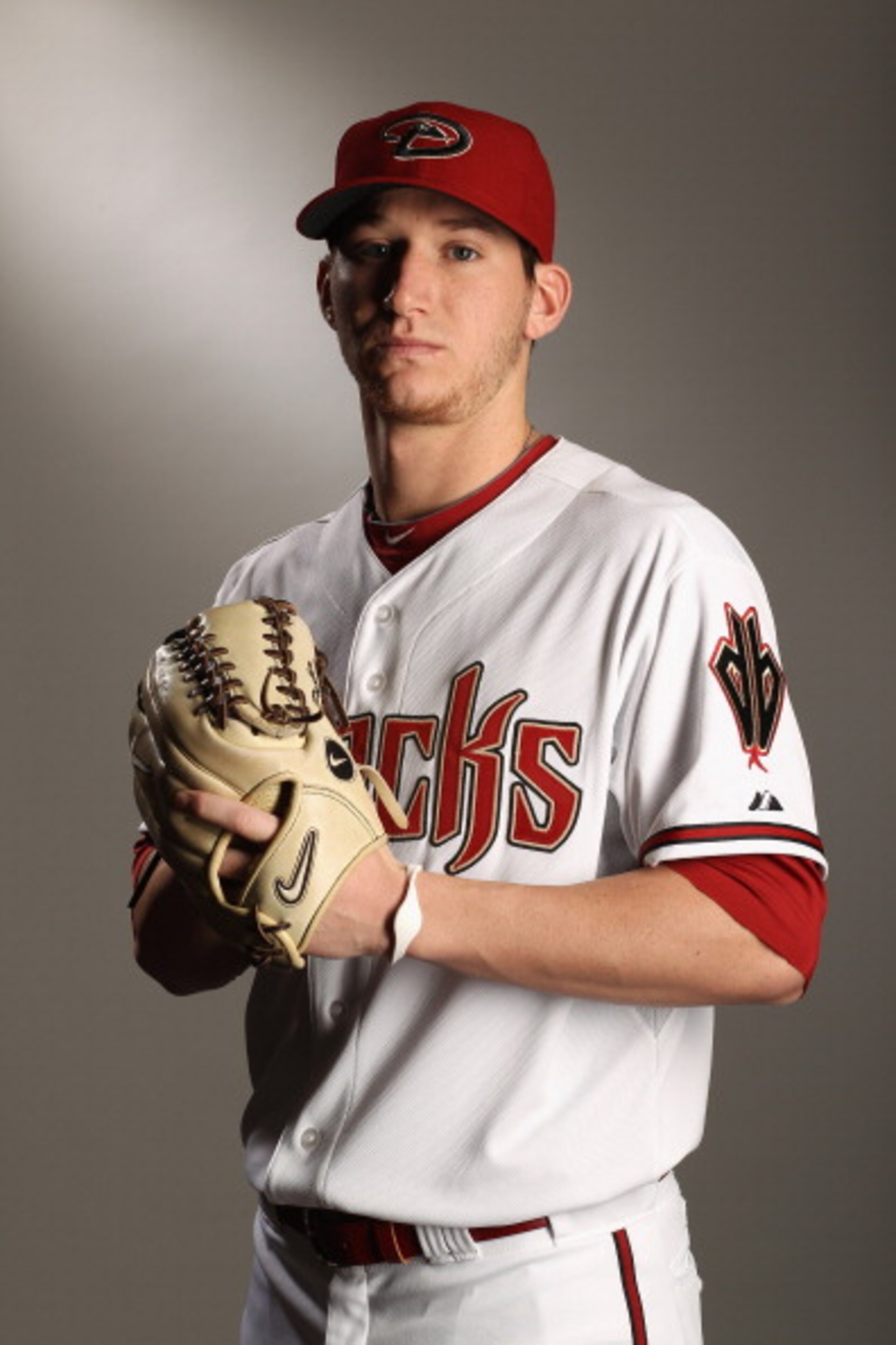 SCOTTSDALE, AZ - FEBRUARY 21:  Jarrod Parker #61 of the Arizona Diamondbacks poses for a portrait at Salt River Fields at Talking Stick on February 21, 2011 in Scottsdale, Arizona.  (Photo by Ezra Shaw/Getty Images)