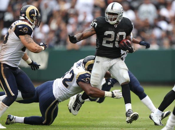 OAKLAND, CA - SEPTEMBER 19:  Darren McFadden #20 of the Oakland Raiders runs against the St. Louis Rams during an NFL game at Oakland-Alameda County Coliseum on September 19, 2010 in Oakland, California.  (Photo by Jed Jacobsohn/Getty Images)