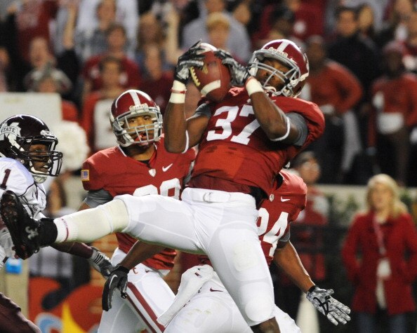 TUSCALOOSA, AL - NOVEMBER 13: Defensive back Robert Lester #37 of the Alabama Crimson Tide intercepts a pass against the Mississippi State Bulldogs November 13, 2010 at Bryant-Denny Stadium in Tuscaloosa, Alabama.  (Photo by Al Messerschmidt/Getty Images)