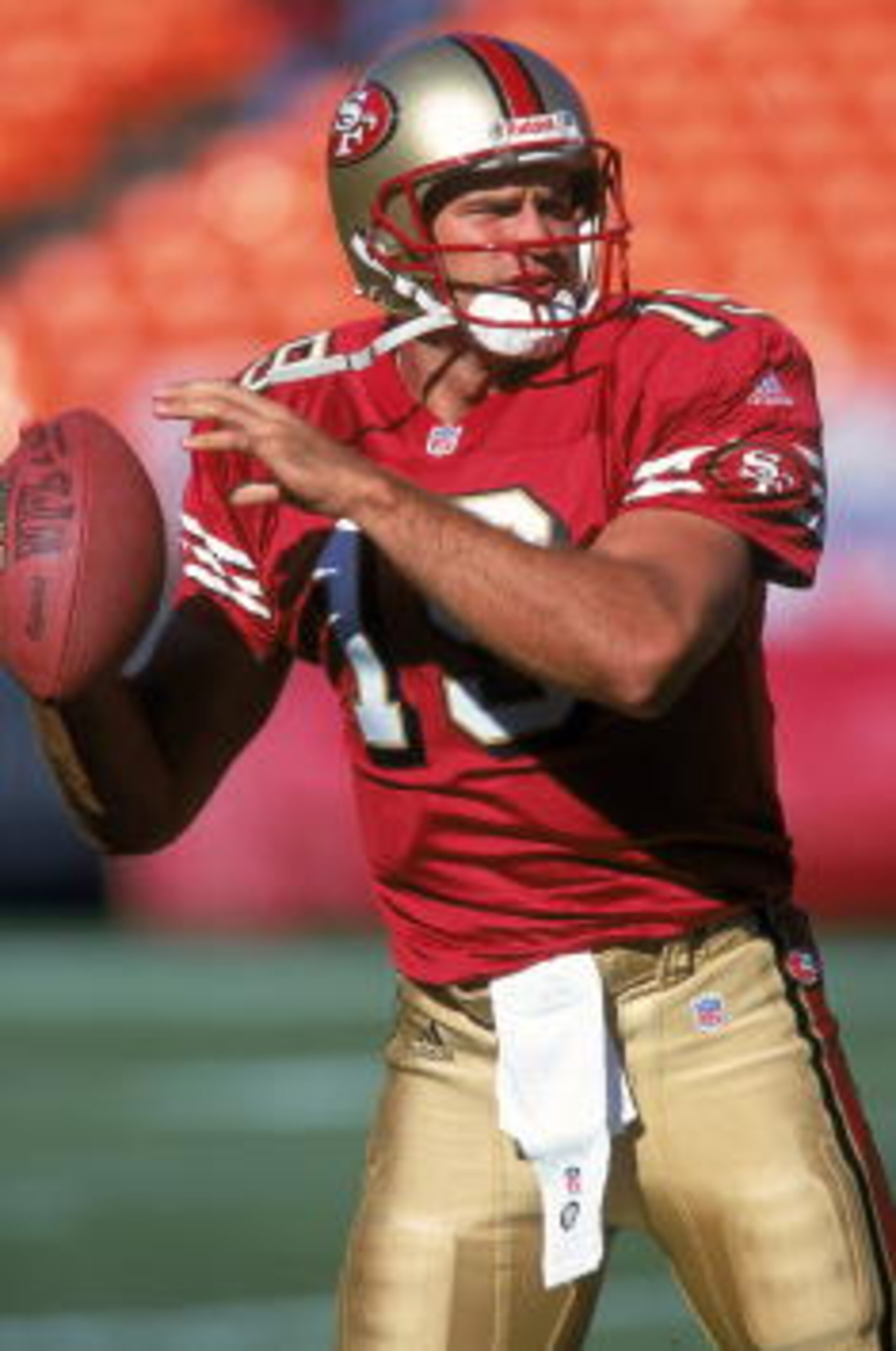 25 Aug 2000:  Quarterback Giovanni Carmazzi #19 of the San Francisco 49ers warms up his arm during practice before the game against the Denver Broncos at 3Com Park in San Francisco, California.  The Broncos defeated the 49ers 28 24.Mandatory Credit: Tom H