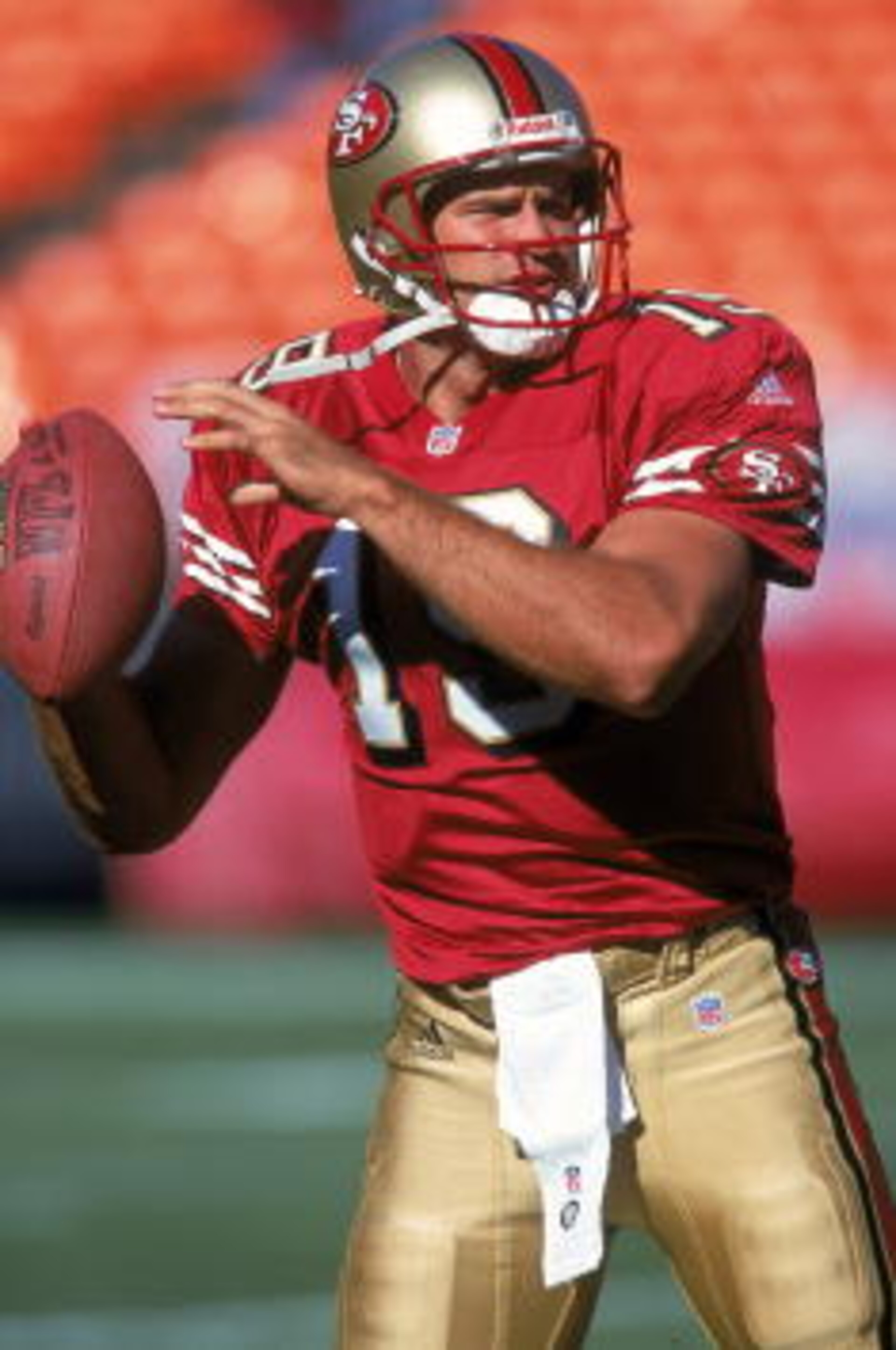 25 Aug 2000:  Quarterback Giovanni Carmazzi #19 of the San Francisco 49ers warms up his arm during practice before the game against the Denver Broncos at 3Com Park in San Francisco, California.  The Broncos defeated the 49ers 28 24.Mandatory Credit: Tom H