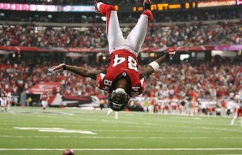 ATLANTA - SEPTEMBER 21: Wide receiver Roddy White #84 of the Atlanta Falcons does a back-flip to celebrate his touchdown in the first quarter against the Kansas City Chiefs at Georgia Dome on September 21, 2008 in Atlanta, Georgia.  (Photo by Doug Benc/Ge