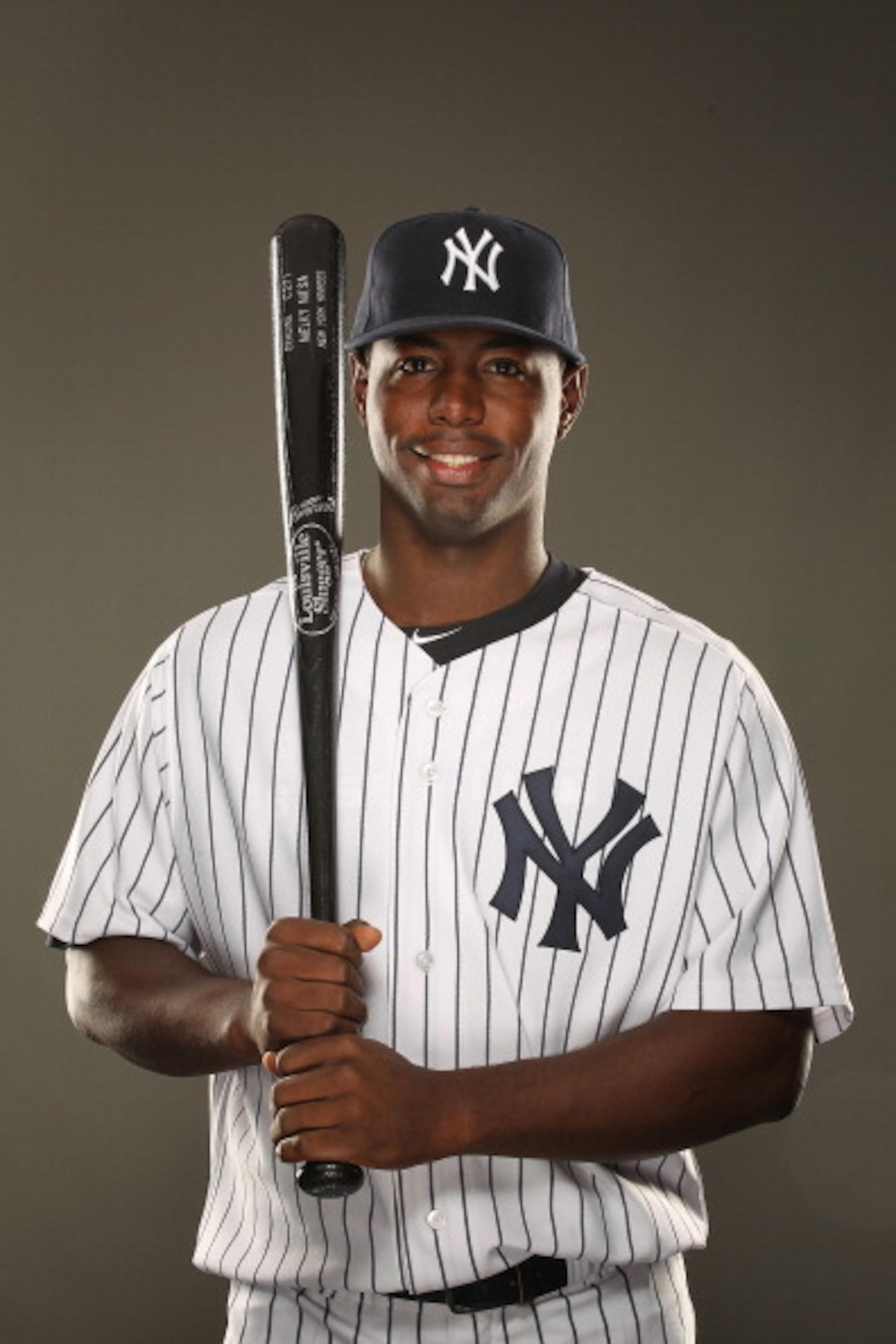 TAMPA, FL - FEBRUARY 23:  Melky Mesa #77 of the New York Yankees poses for a portrait on Photo Day at George M. Steinbrenner Field on February 23, 2011 in Tampa, Florida.  (Photo by Al Bello/Getty Images)