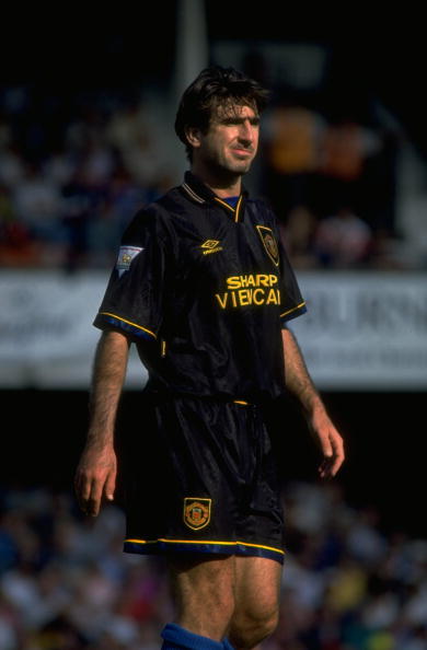 28 Aug 1993:  Eric Cantona of Manchester United pauses for breath during the Football Association Carling Premiership match against Southampton at The Dell in Southampton, England. Manchester United won the match 3-1.   \ Mandatory Credit: Steve  Morton/A