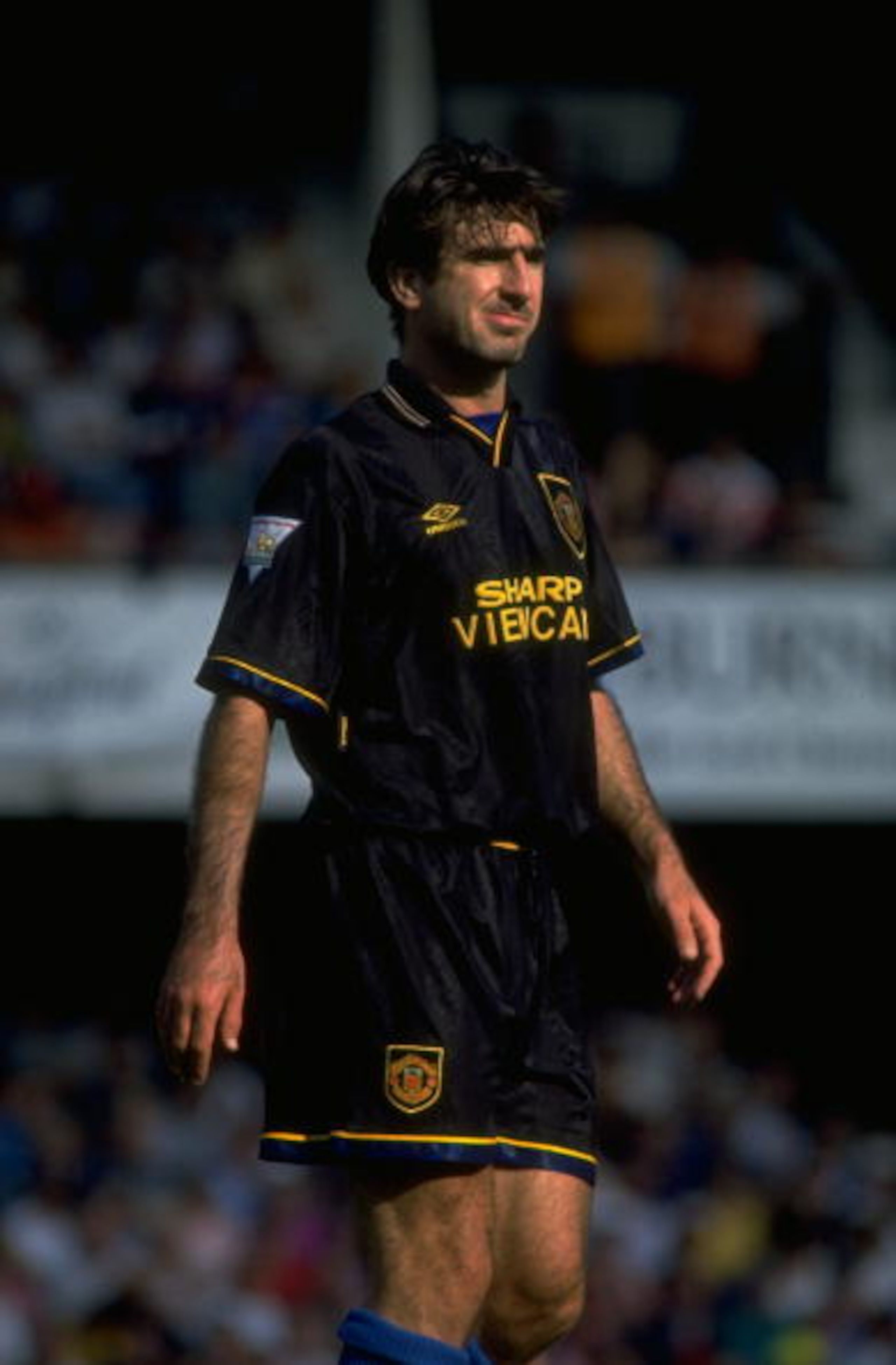 28 Aug 1993: Eric Cantona of Manchester United pauses for breath during the Football Association Carling Premiership match against Southampton at The Dell in Southampton, England. Manchester United won the match 3-1. \ Mandatory Credit: Steve Morton/A 28 Aug 1993: Eric Cantona of Manchester United pauses for breath during the Football Association Carling Premiership match against Southampton at The Dell in Southampton, England. Manchester United won the match 3-1. \ Mandatory Credit: Steve Morton/A