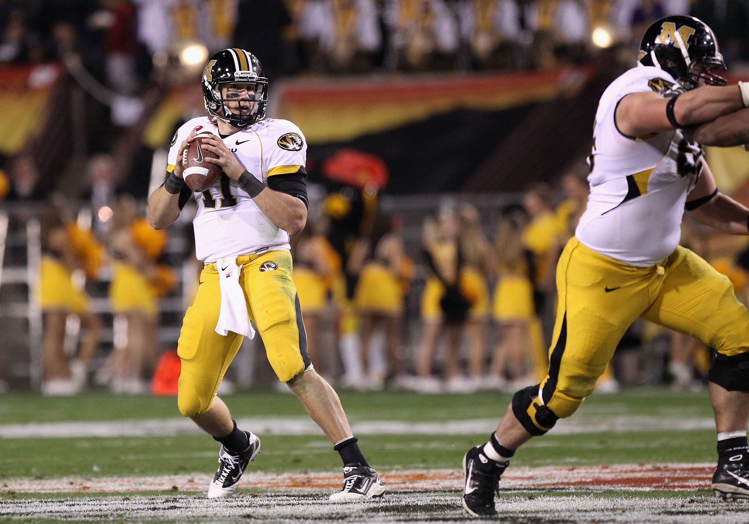 TEMPE, AZ - DECEMBER 28:  Quarterback Blaine Gabbert #11 of the Missouri Tigers drops back to pass during the Insight Bowl against the Iowa Hawkeyes  at Sun Devil Stadium on December 28, 2010 in Tempe, Arizona.  The Hawkeyes defeated the Tigers 27-24.  (P