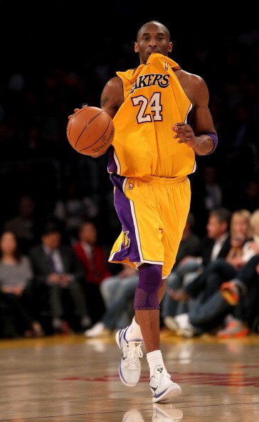 LOS ANGELES, CA - APRIL 05:  Kobe Bryant #24 of the Los Angeles Lakers controls the ball against the Utah Jazz at Staples Center on April 5, 2011 in Los Angeles, California. The Jazz won 86-85.  NOTE TO USER: User expressly acknowledges and agrees that, b