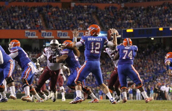 GAINESVILLE, FL - NOVEMBER 13:  John Brantley #12 of the Florida Gators passes during a game against the South Carolina Gamecocks at Ben Hill Griffin Stadium on November 13, 2010 in Gainesville, Florida.  (Photo by Mike Ehrmann/Getty Images)