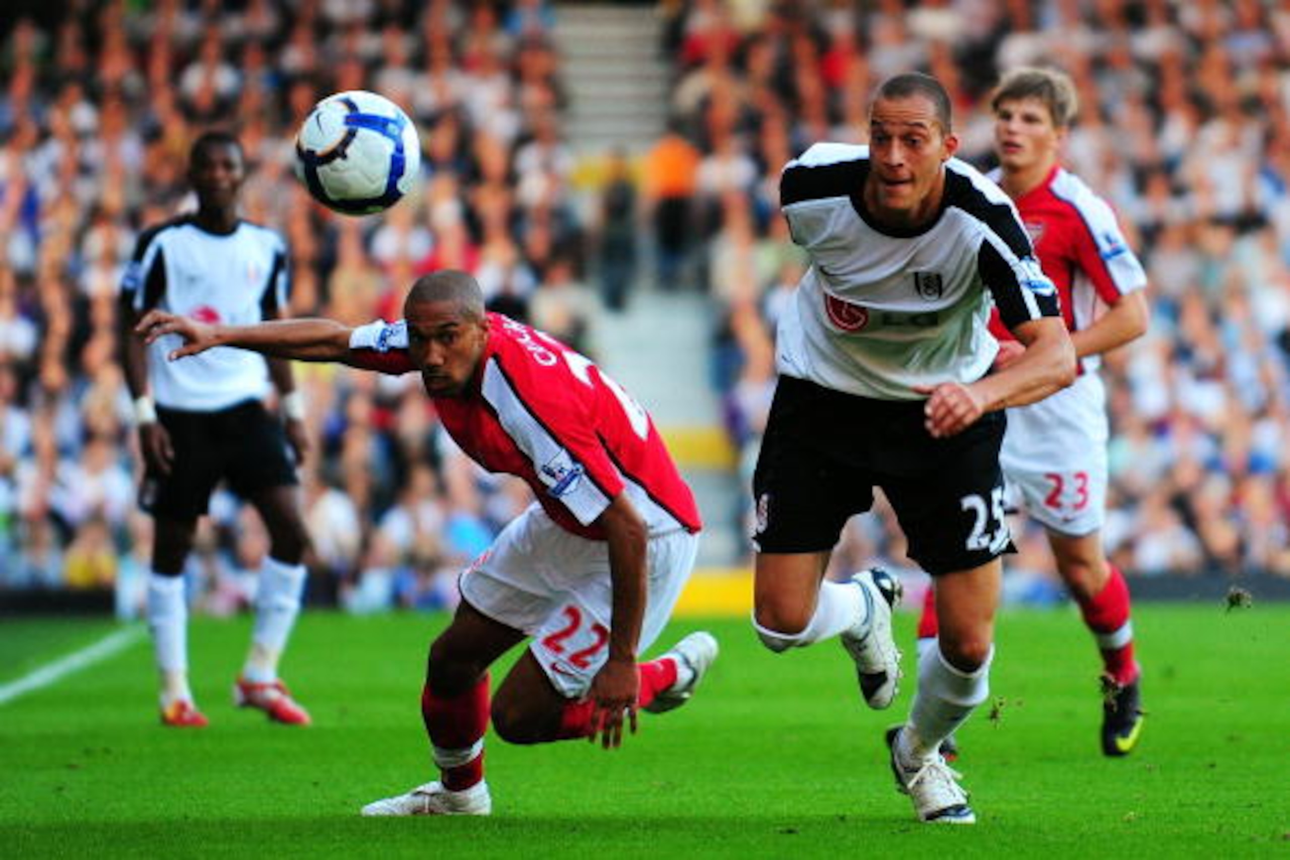 LONDON, ENGLAND - SEPTEMBER 26:  Bobby Zamora of Fulham and Gael Clichy of Arsenal chase the ball during the Barclays Premier League match between Fulham and Arsenal at Craven Cottage on September 26, 2009 in London, England.  (Photo by Mike Hewitt/Getty 