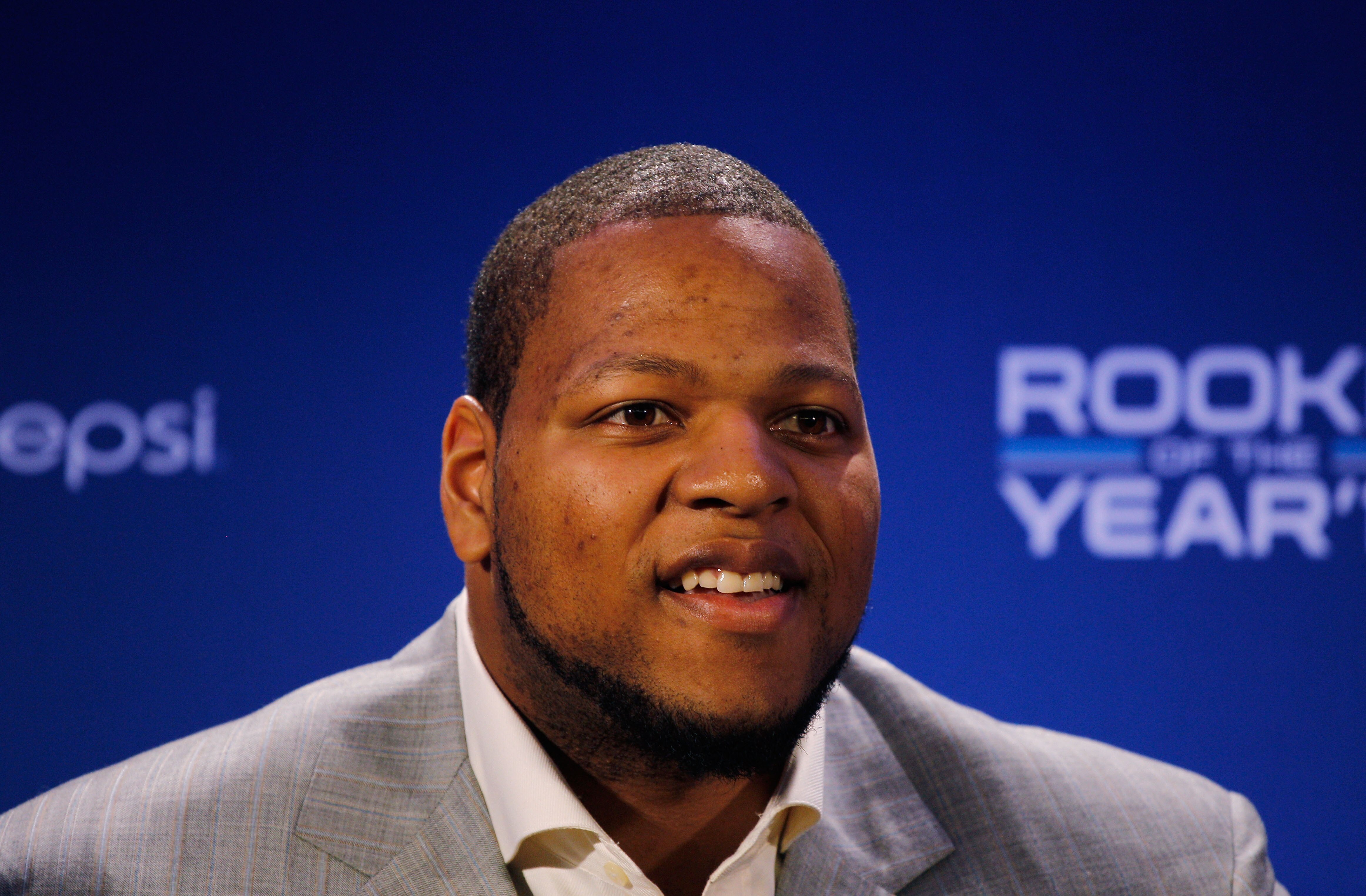 DALLAS, TX - FEBRUARY 03:  Ndamukong Suh #90 of the Detroit Lions speaks during a press conference where he accepted Pepsi's 2010 NFL Rookie of the Year Award at the Super Bowl XLV media center on February 3, 2011 in Dallas, Texas. The Green Bay Packers w
