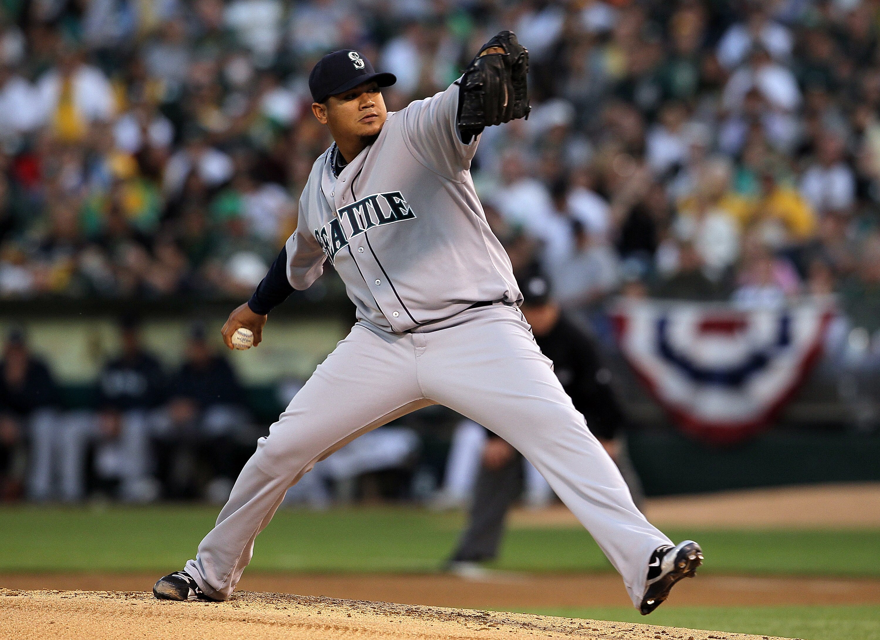 OAKLAND, CA - APRIL 01:  Felix Hernandez #34 of the Seattle Mariners pitches against the Oakland Athletics during the first inning at the Oakland-Alameda County Coliseum on April 1, 2011 in Oakland, California  (Photo by Justin Sullivan/Getty Images)