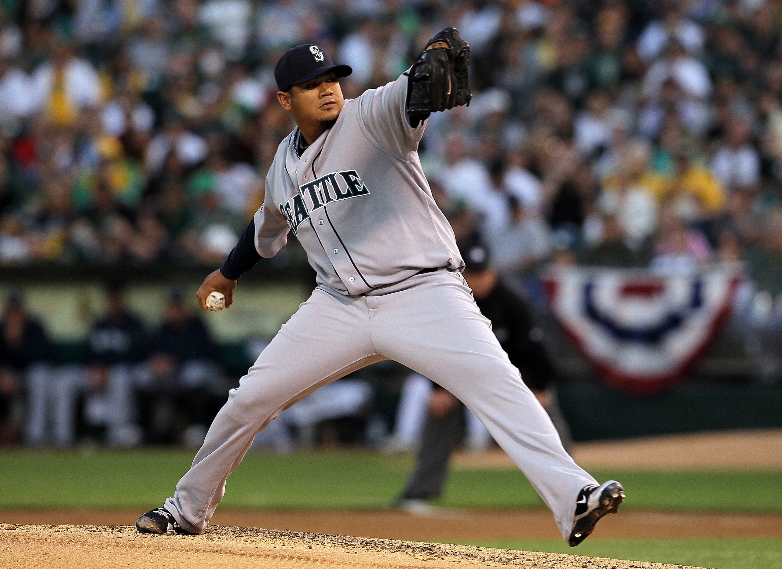 OAKLAND, CA - APRIL 01:  Felix Hernandez #34 of the Seattle Mariners pitches against the Oakland Athletics during the first inning at the Oakland-Alameda County Coliseum on April 1, 2011 in Oakland, California  (Photo by Justin Sullivan/Getty Images)