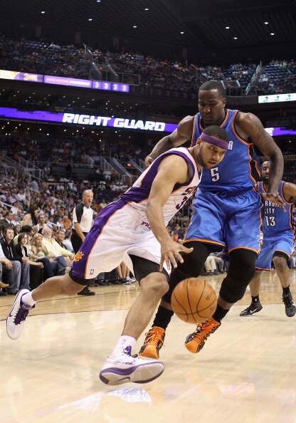PHOENIX, AZ - MARCH 30:  Jared Dudley #3 of the Phoenix Suns drives the ball past Kendrick Perkins #5 of the Oklahoma City Thunder during the NBA game at US Airways Center on March 30, 2011 in Phoenix, Arizona.  The Thunder defeated the Suns 116-98. NOTE 